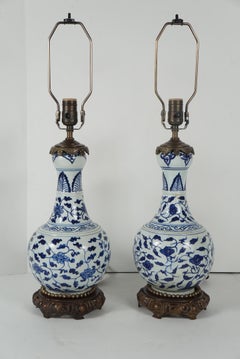 Pair of Bronze Accented Chinese Blue & White Garlic Head Vases Mounted as Lamps