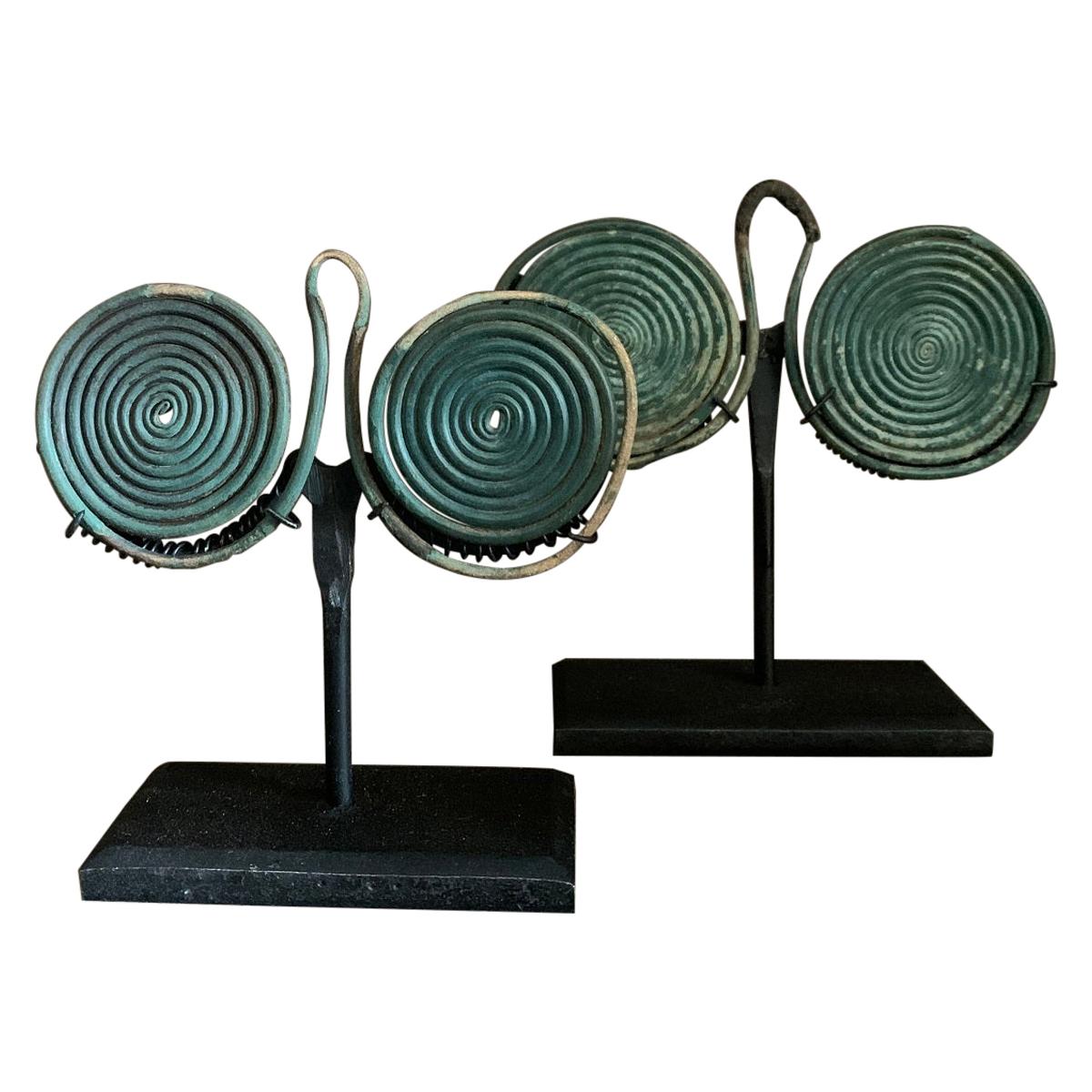 Pair of Bronze Age Spiral Pendants For Sale