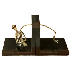 Pair of Bronze and Black Lacquer Fisherman Bookends