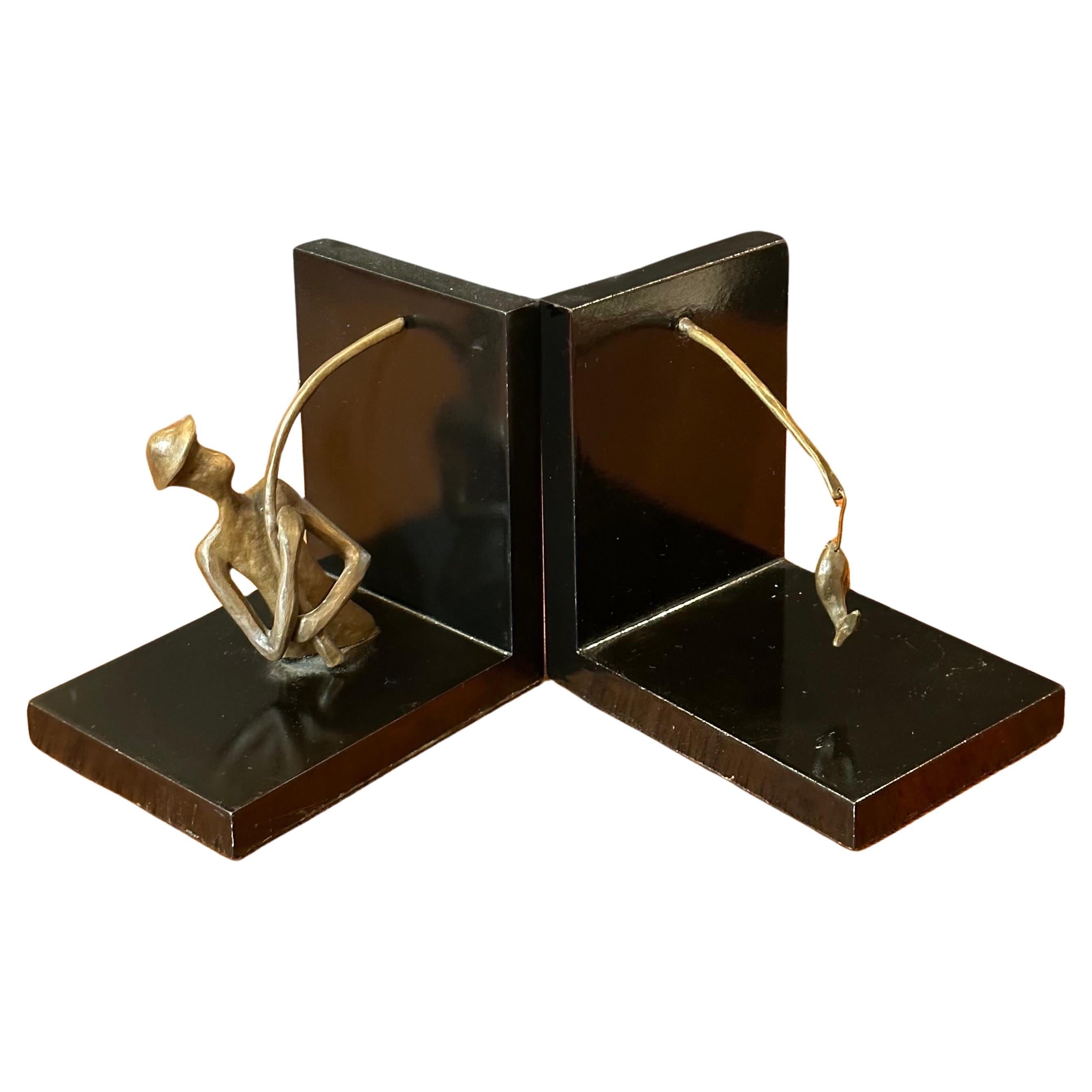 Mid-Century Modern Pair of Bronze and Black Lacquer Fisherman Bookends For Sale