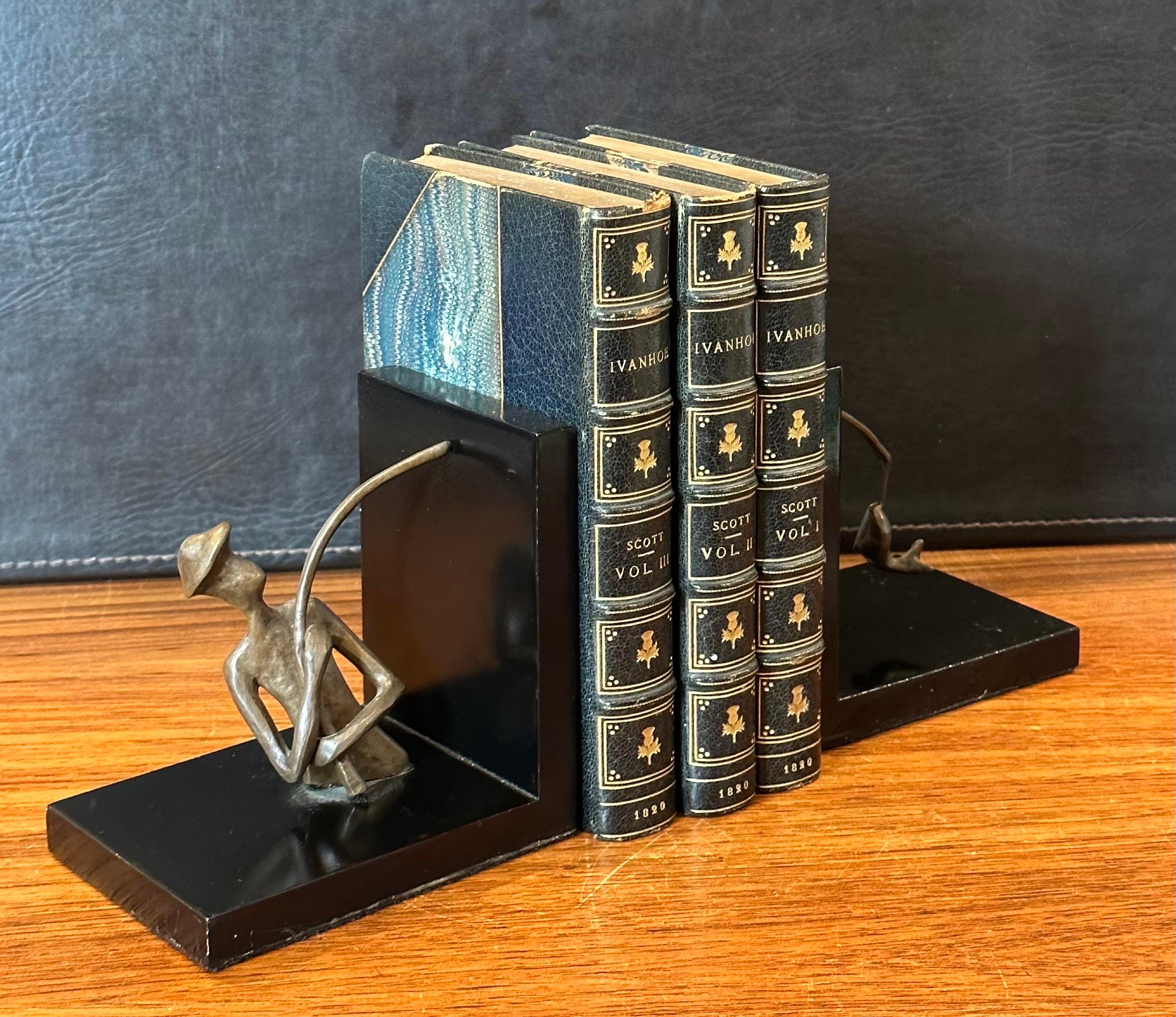 Pair of Bronze and Black Lacquer Fisherman Bookends In Good Condition For Sale In San Diego, CA