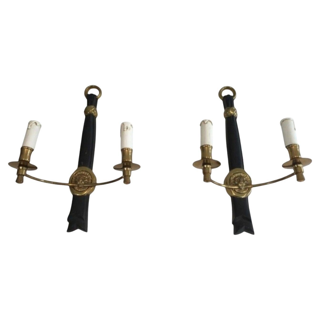 Coppia di sconsigliere in bronzo e laccato nero con teste di leone, Francia, circa 1970