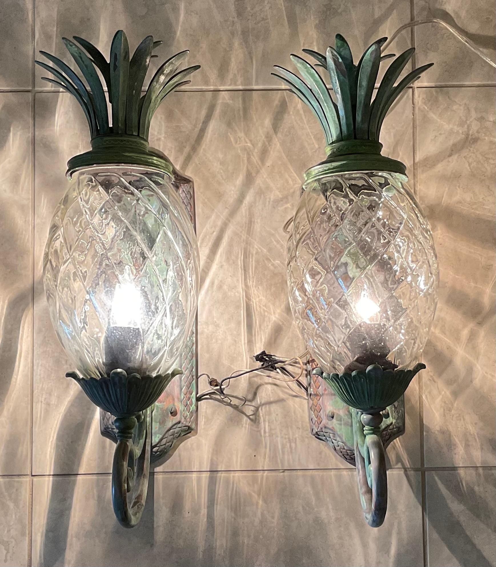 Beautiful pair of pineapple wall lights, made of bronze and solid brass with one 60/watt light each , great patina , decorative for indoor or outdoor.
Ready to use