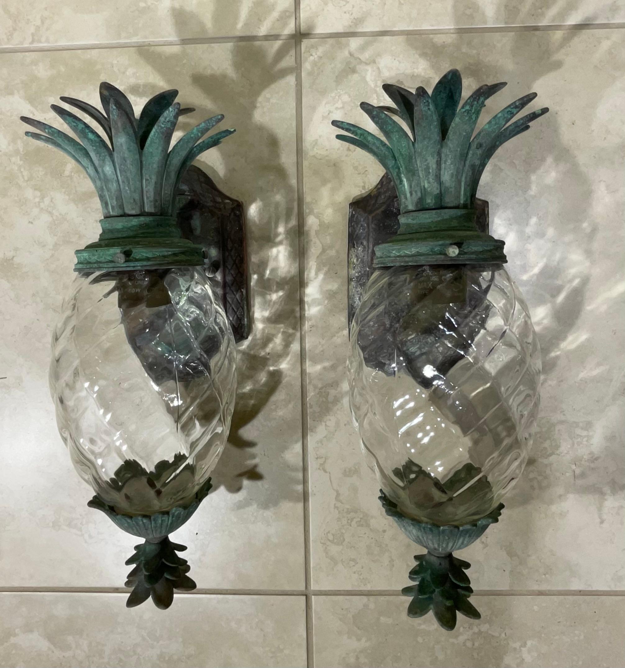 Beautiful pair of pineapple wall light made of bronze and solid brass with one 60/watt light each, great patina, decorative for indoor or outdoor.
Ready to use.