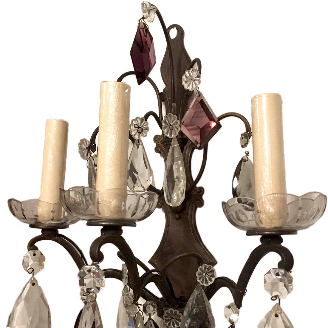 Pair of 1920s French patinated bronze and crystal sconces with 3 lights.
Measurements:
Height 15