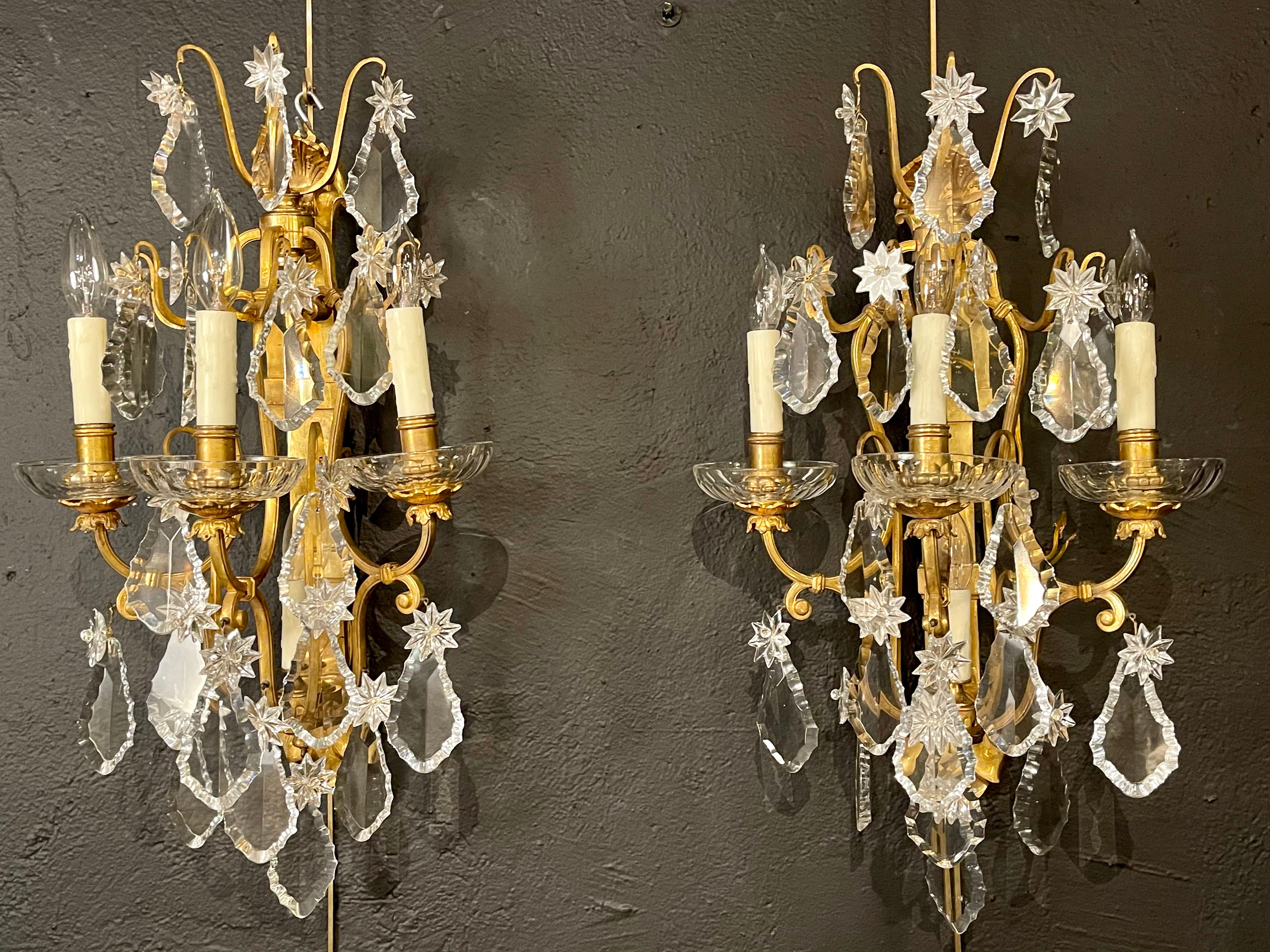 brass and crystal wall sconces