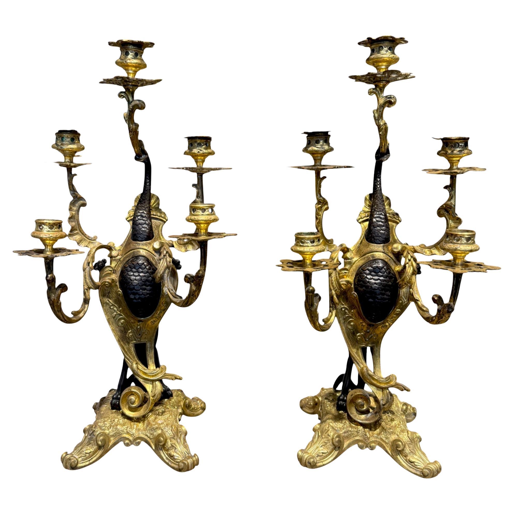 Pareja de candelabros de bronce y dorado, Francia, S. XIX en venta