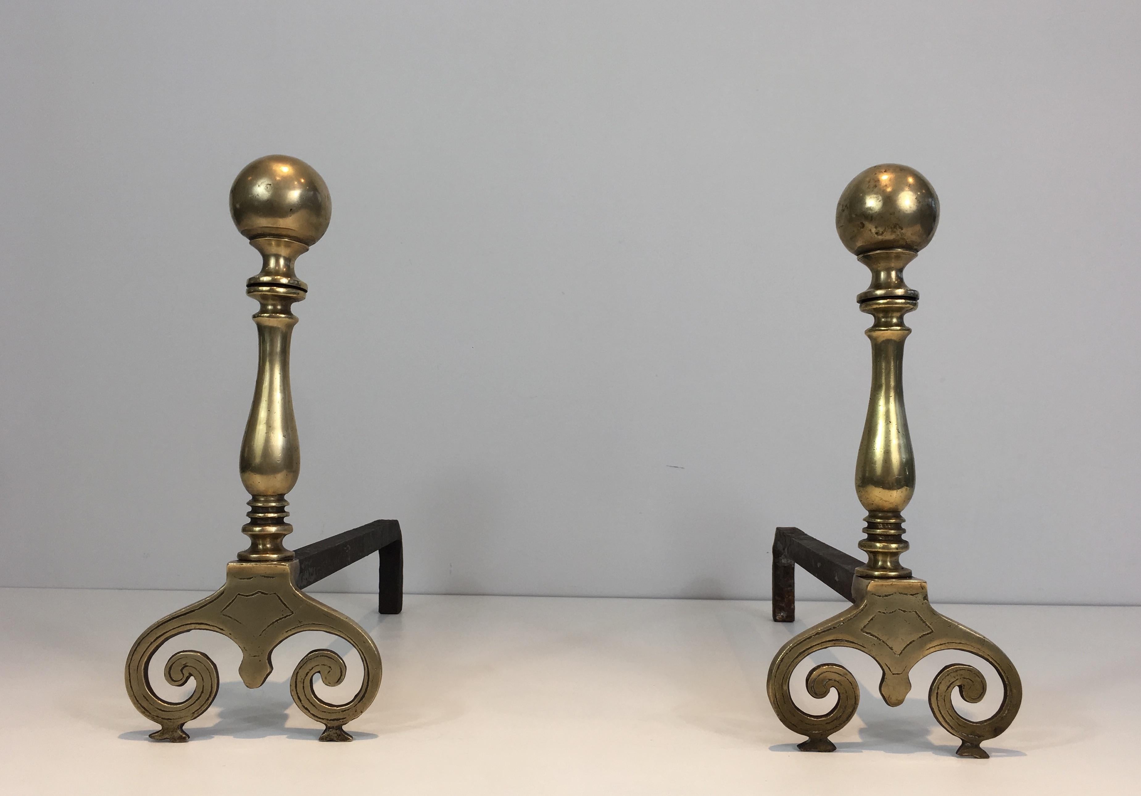 This pair of andirons is made of Bronze andiron. This is a French work, from 18th century.