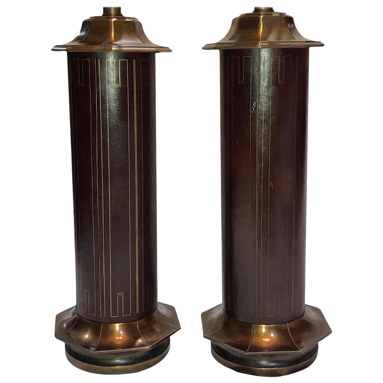 Paar Bronze- und Leder-Tischlampen