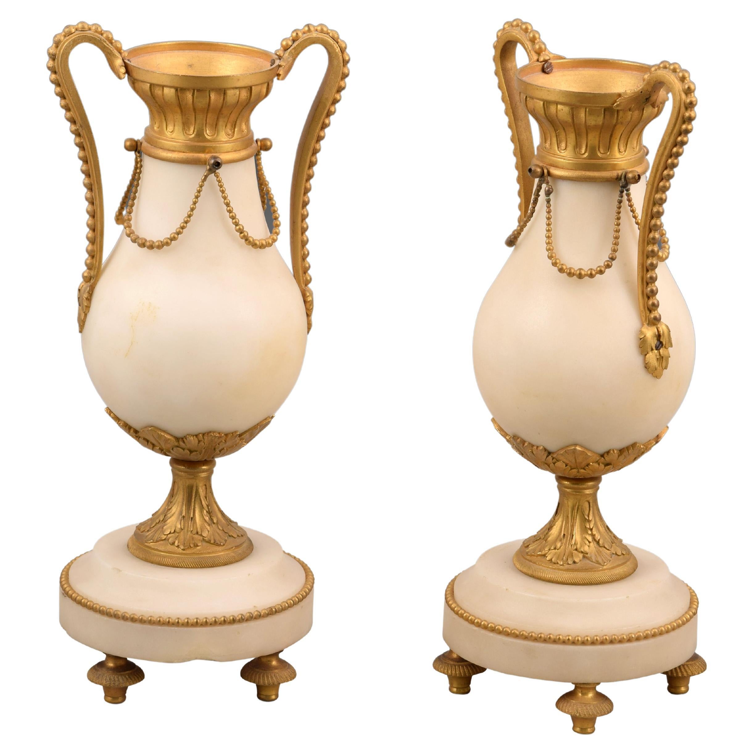 Pair of bronze and marble vases. 19th century.