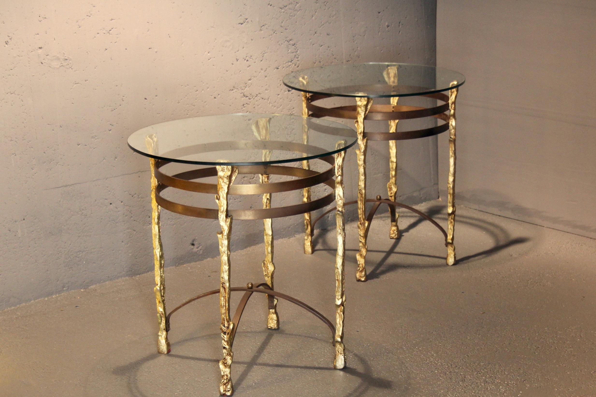 Pair of side table bronze and metal the top is a round glass 