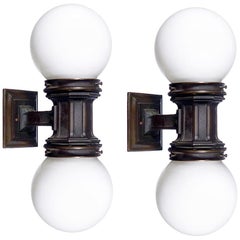 Pair of Bronze and Milk Glass Elevator Sconces