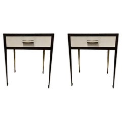 Pair of bronze and steel bedside tables with parchment panels