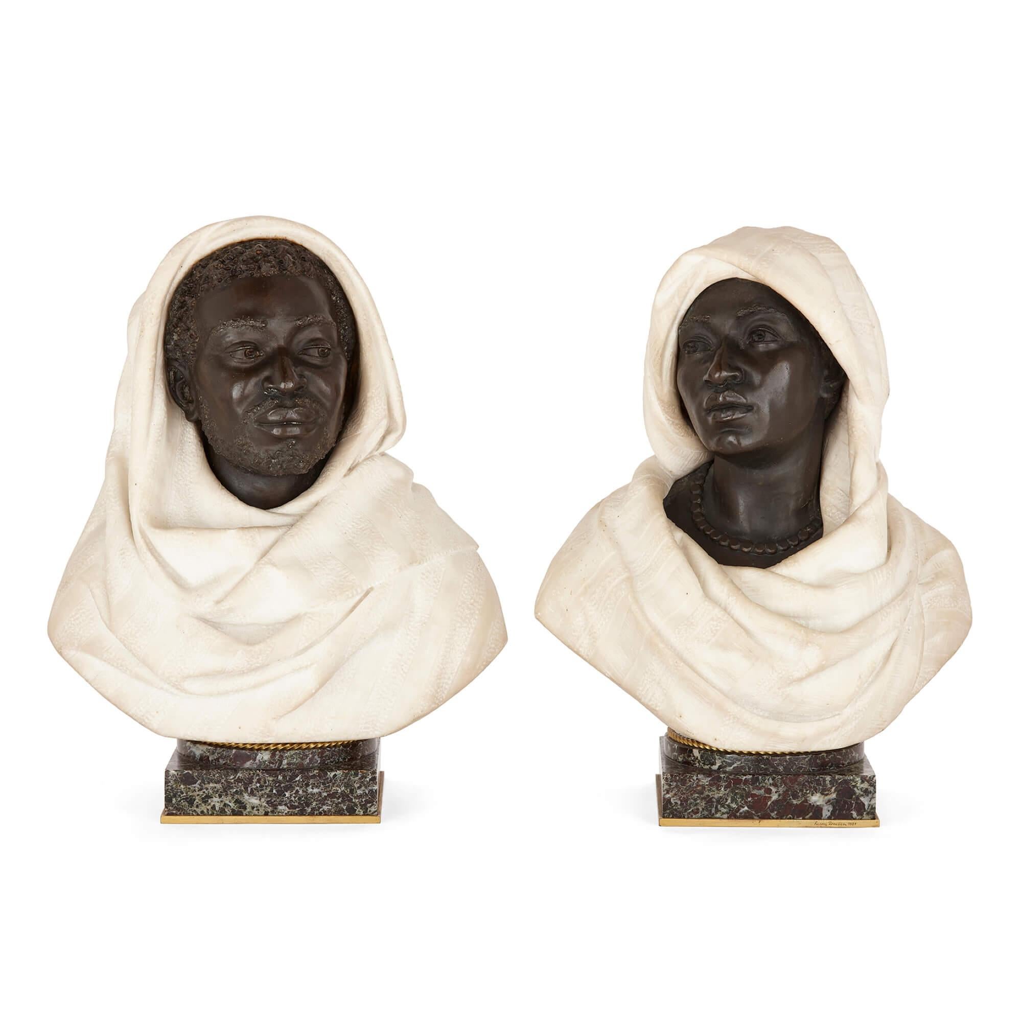 Pair of bronze and marble busts of a North African man and woman
by C. Caccia, Italian, 1883, the base by H. Dasson, 1885
Measures: Height 44cm, width 35cm, depth 21cm

Provenance: from the collection of the late Sir Arthur Gilbert

This