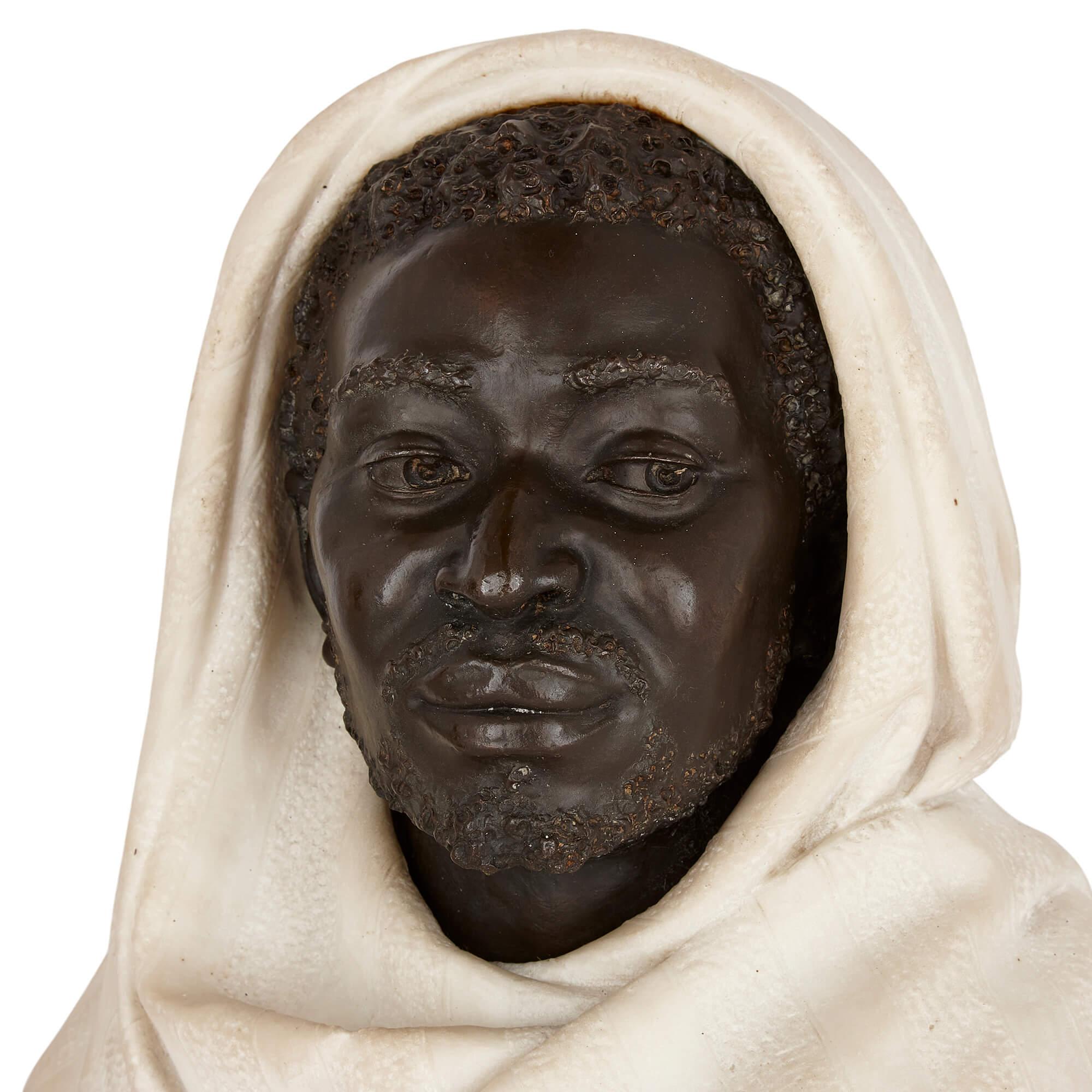 Paar Bronze- und weiße Marmorbüsten eines nordafrikanischen Mannes und einer Frau im Zustand „Hervorragend“ im Angebot in London, GB