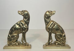 Pair of Bronze Andirons Representing Dogs. French work From Art Deco Period