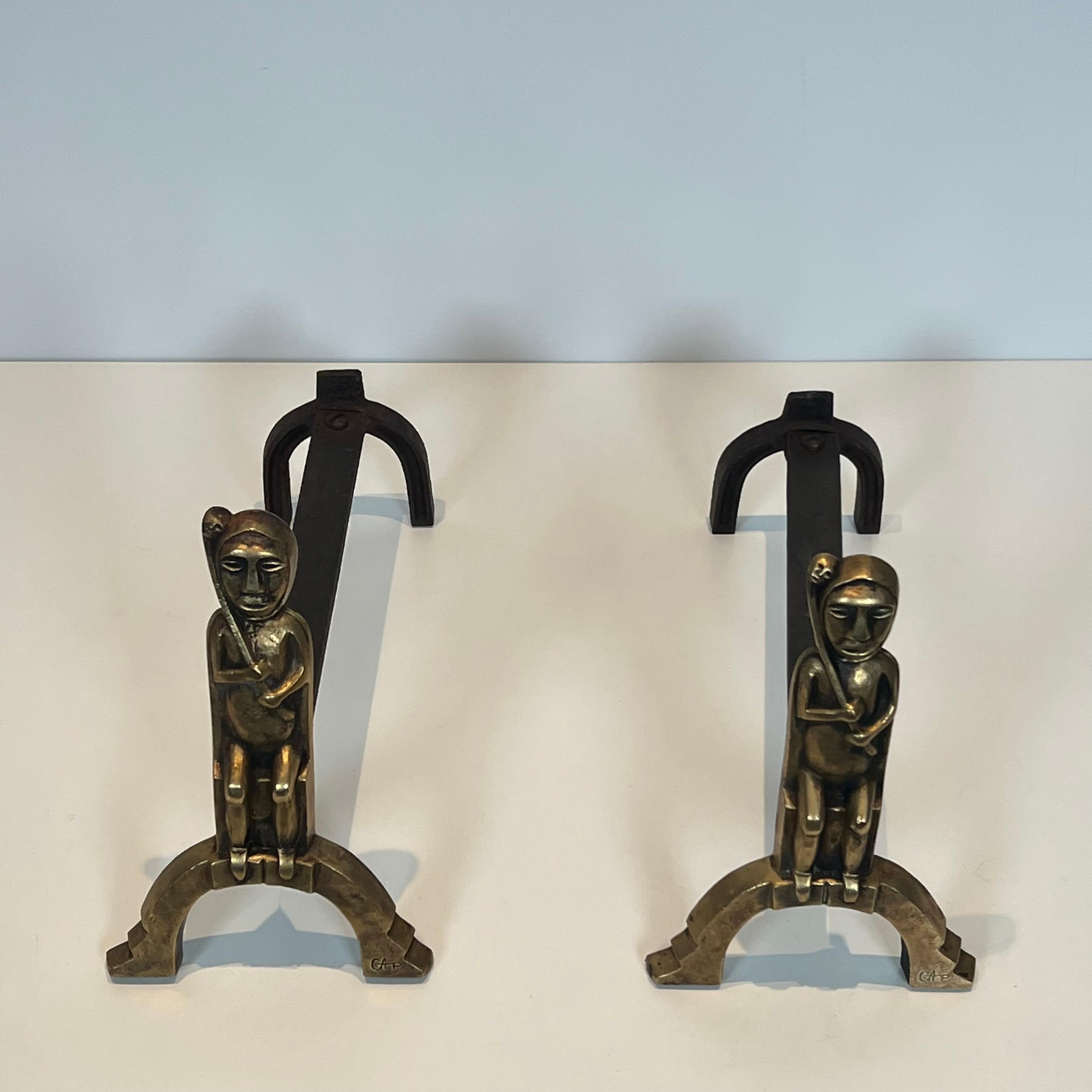 Mid-Century Modern Pair of Bronze Andirons with Seated Shamans, Monogramed by Anton Prinner For Sale