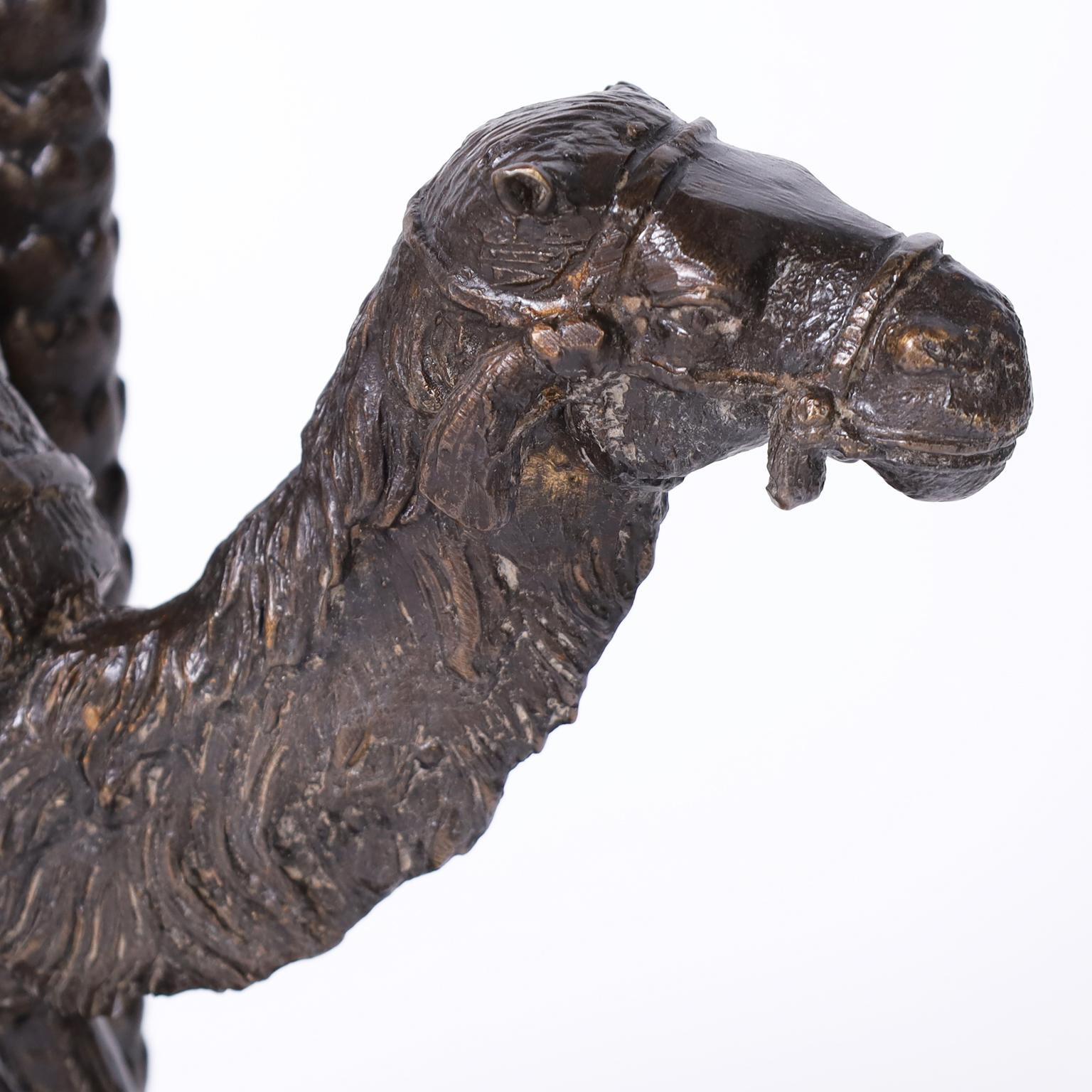 20th Century Pair of Bronze Anglo Indian Palm Tree Candlesticks with Camels