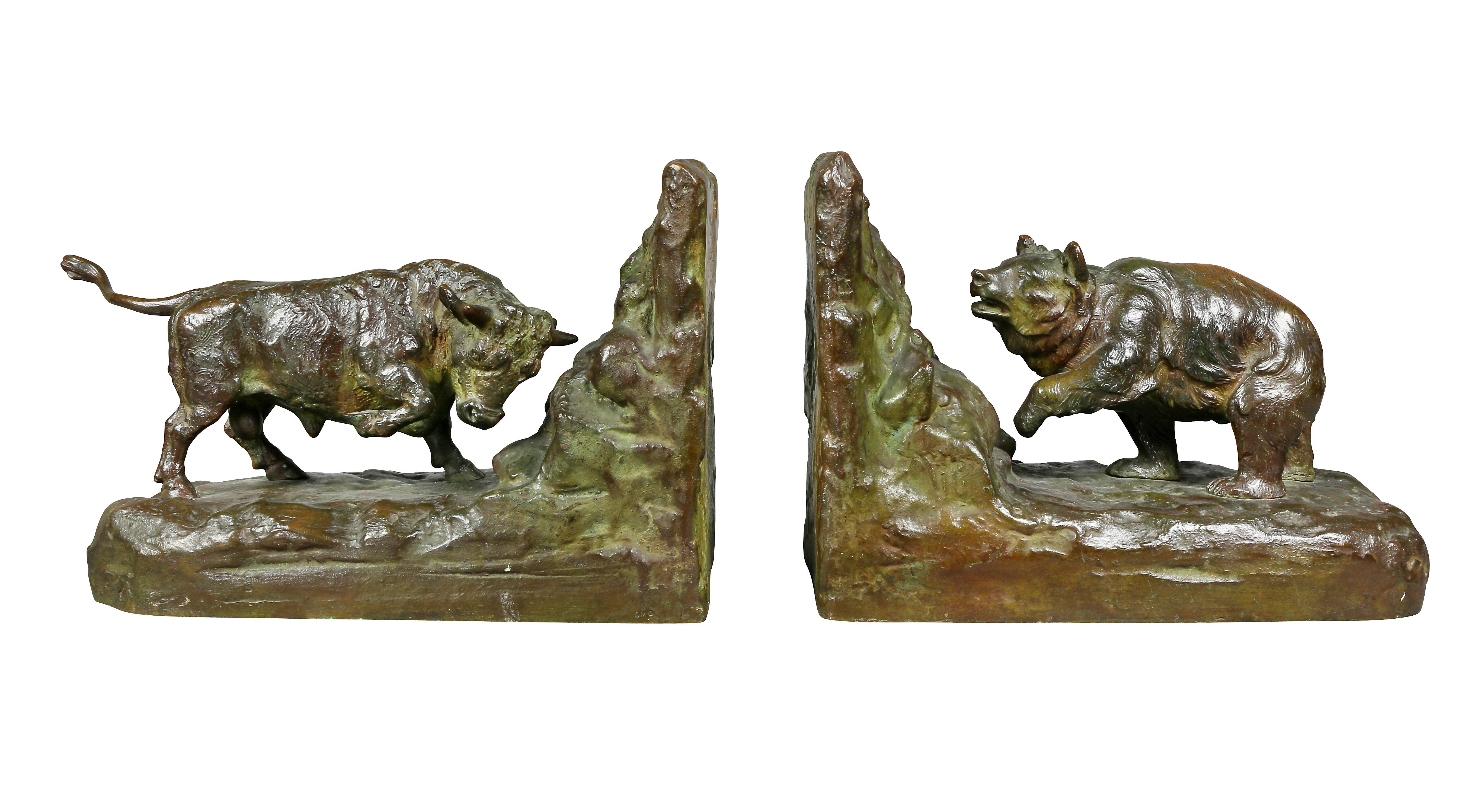 One of a bull and the other a bear. Gorham Foundry mark. These have a gorgeous patina and a retailed by one of the top luxury shops in NYC back in the day and cast by one of the very top founderies. Currently I am researching who the artist was.