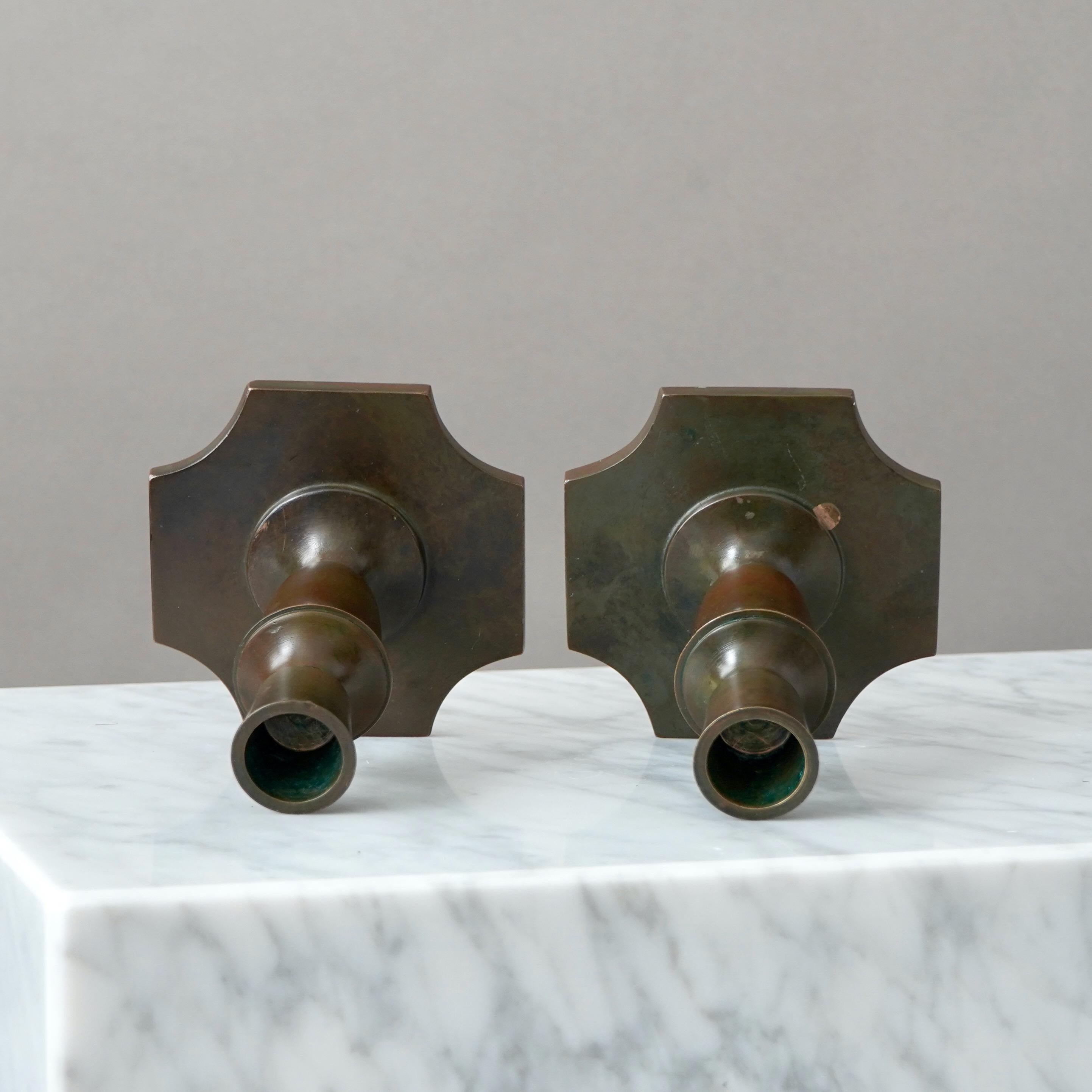 Cast Pair of Bronze Art Deco Candlesticks by GAB Guldsmedsaktiebolaget, Sweden, 1930s