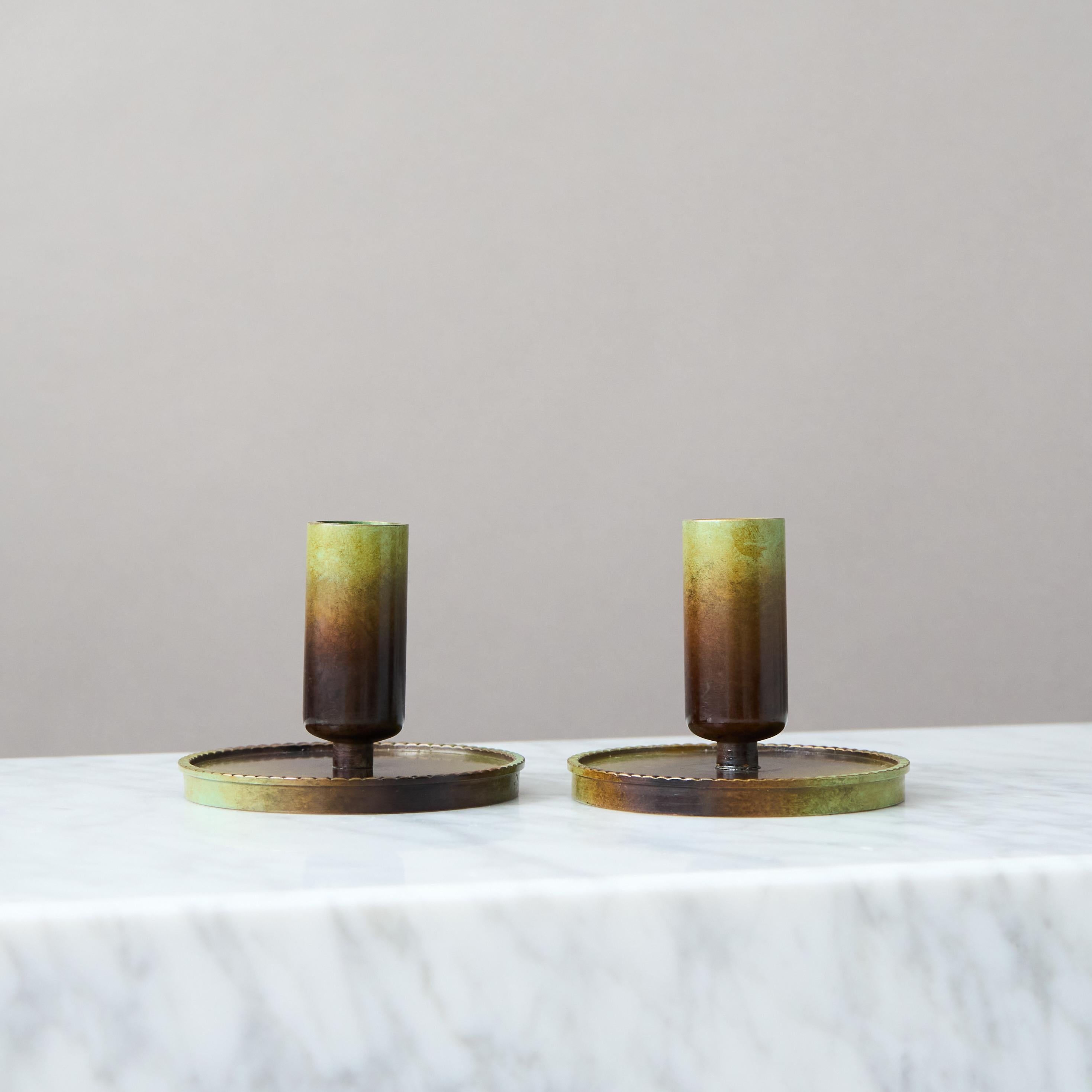 A pair of bronze Art Deco / Swedish Grace candlesticks with amazing patina. 
Designed by Carl-Einar Borgström and made by Ystad Metall / Brons, Sweden, 1930s.  

Great condition, only some light scratches.
Stamped 'ceb' and makers mark.

Carl-Einar