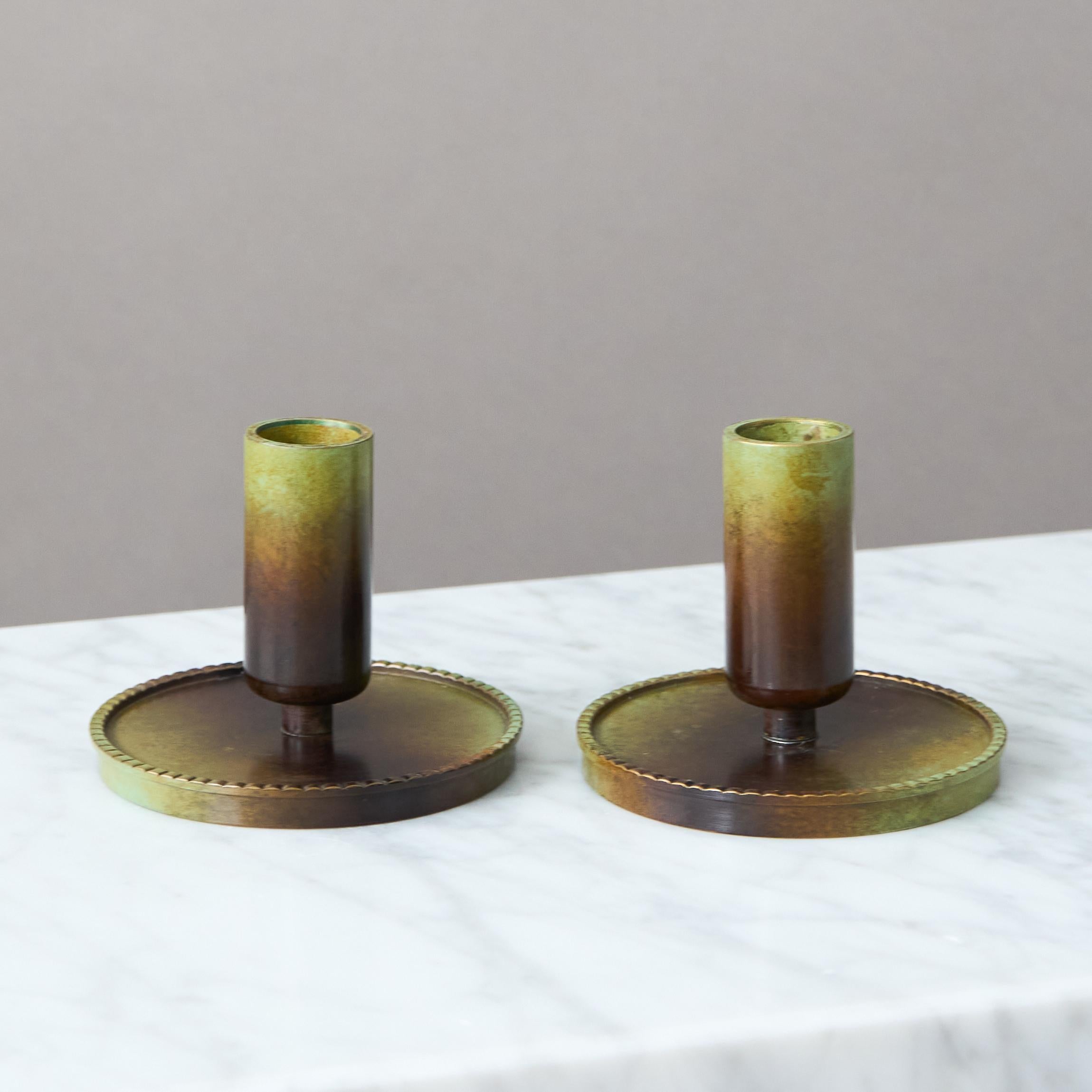 Cast Pair of Bronze Art Deco Candlesticks by Ystad Brons, Sweden, 1930s For Sale