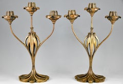 Pareja de candelabros Art Nouveau de bronce con diseño floral de Georges De Feure
