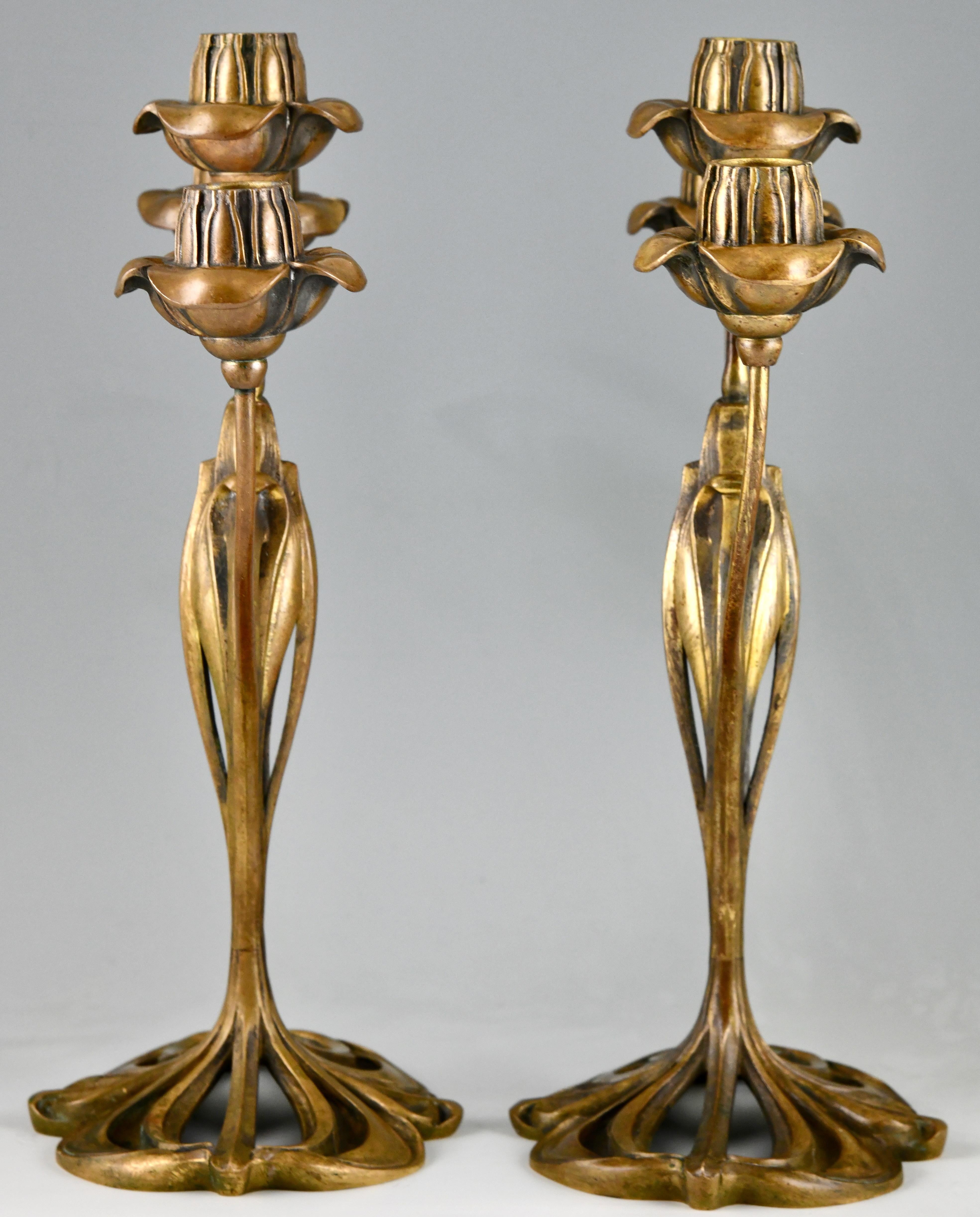 Pair of bronze Art Nouveau candelabra with floral design by Georges de Feure In Good Condition For Sale In Antwerp, BE