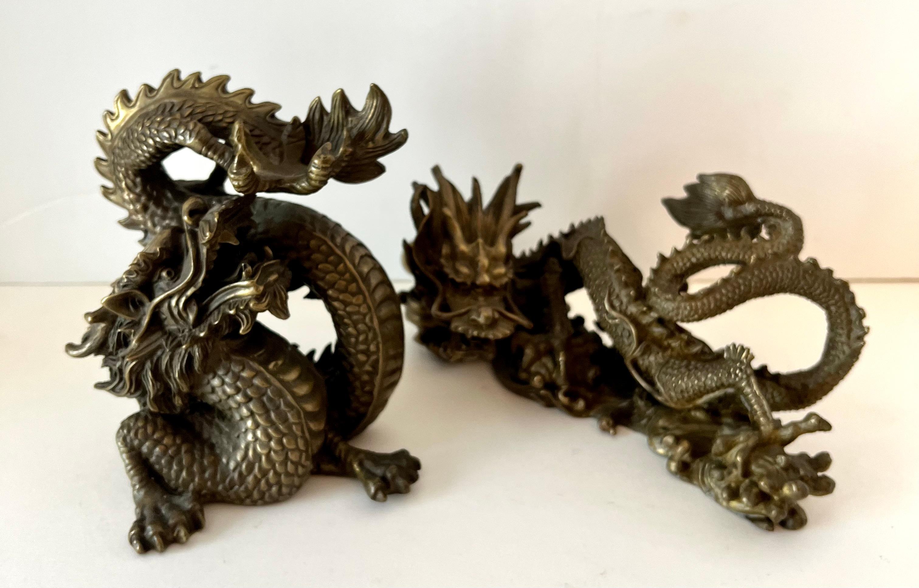 A pair of Dragons - the pair are very nice and well made.  They each have a weight of about 2.5 pounds each making them not only decorative, but could be used as bookends of paperweights.

one measures:  3.5