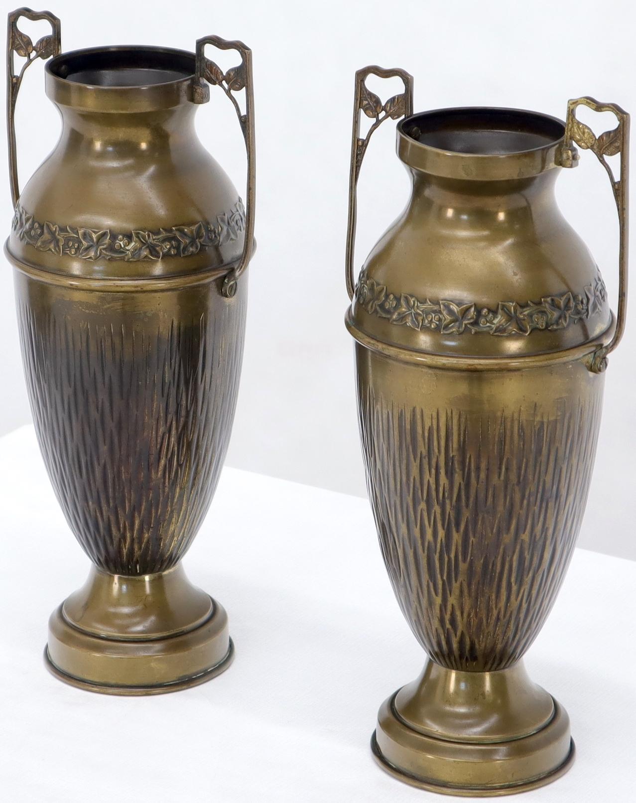Pair of brass or bronze Bohemian or Art Nouveau style urn shape double handled vases.