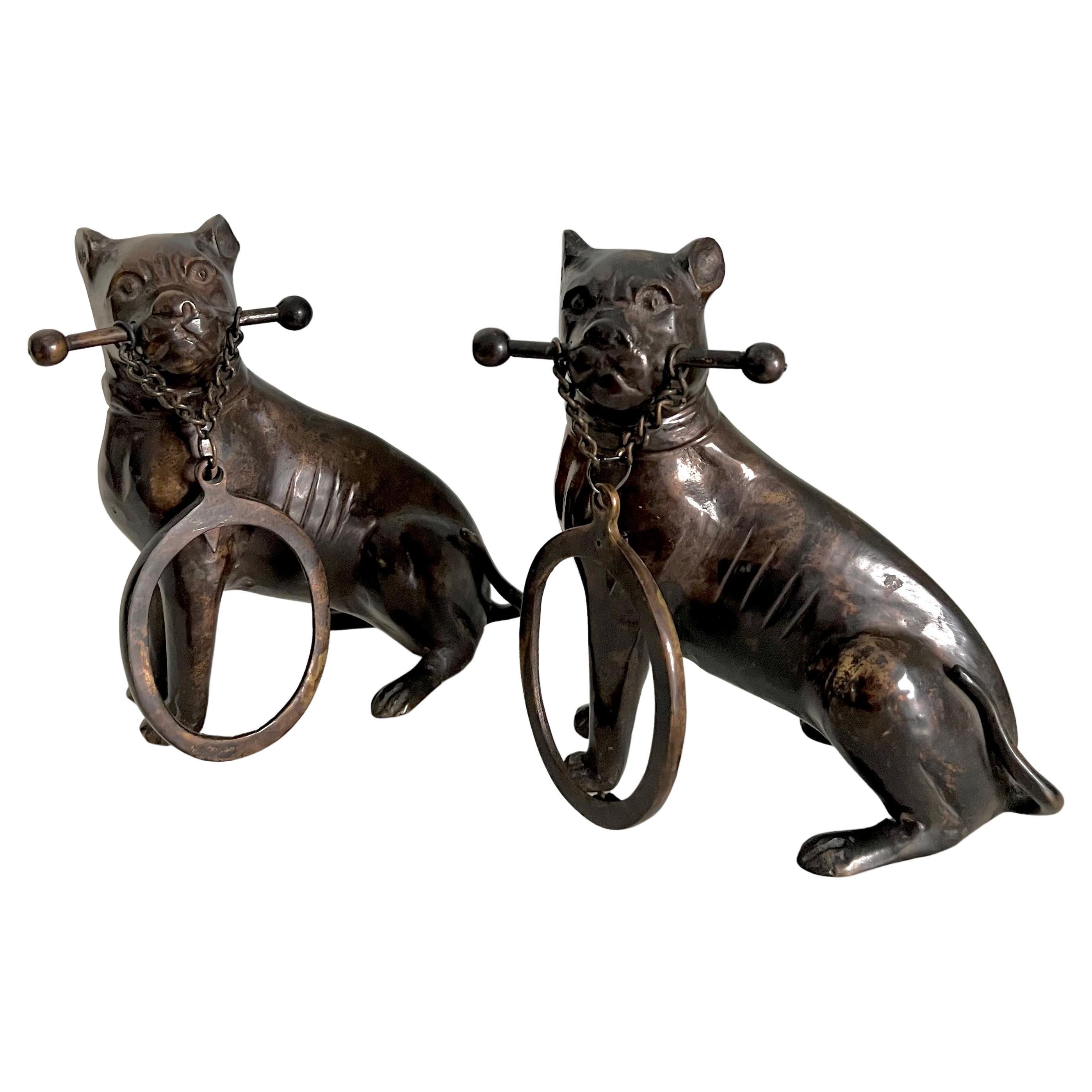 Pair of Bronze Boxer Dog Bookends Holding an Oval Picture Frame For Sale