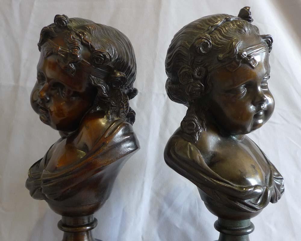  Pair of bronze busts of childs' heads on marble bases. In Good Condition For Sale In London, GB