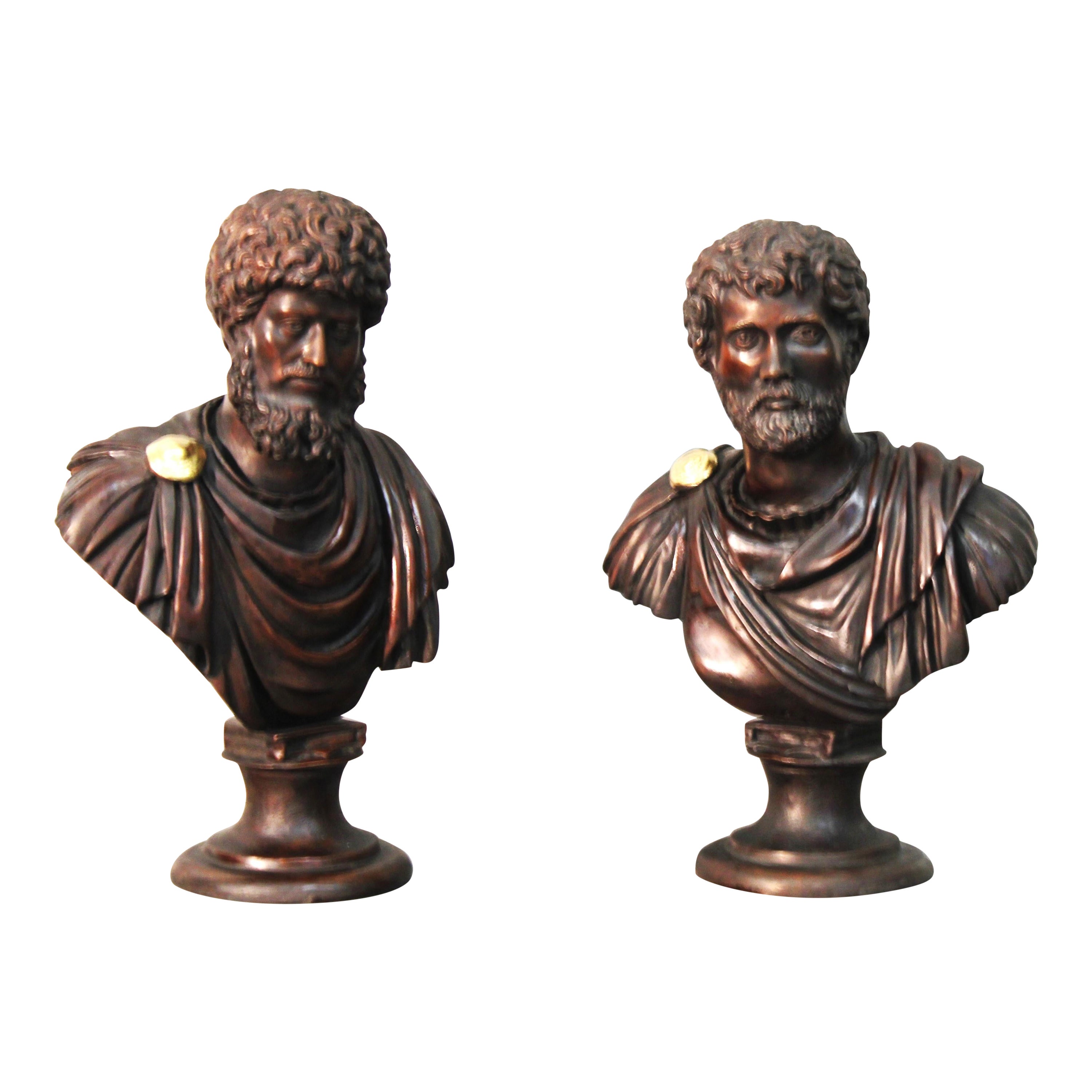 Coppia di busti di imperatori in bronzo