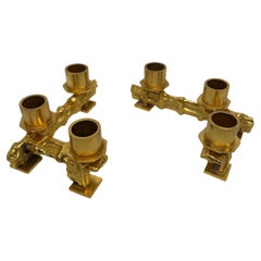 pair of bronze candleholders