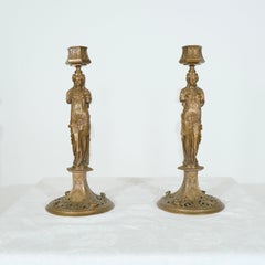 Pair of bronze candlesticks signed Barbedienne (1838-)