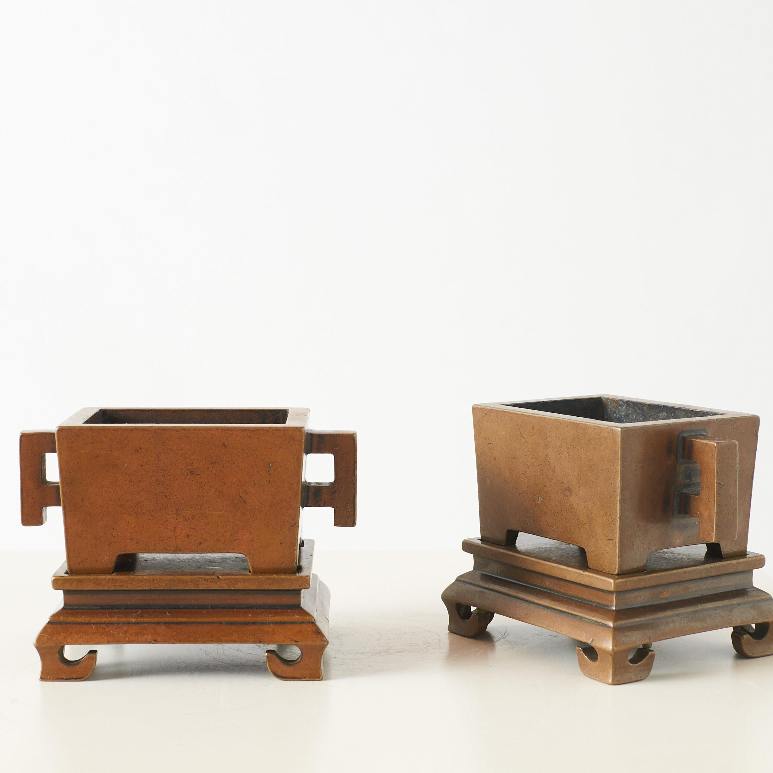Chinese Pair of Bronze Censers on Carved Bases For Sale