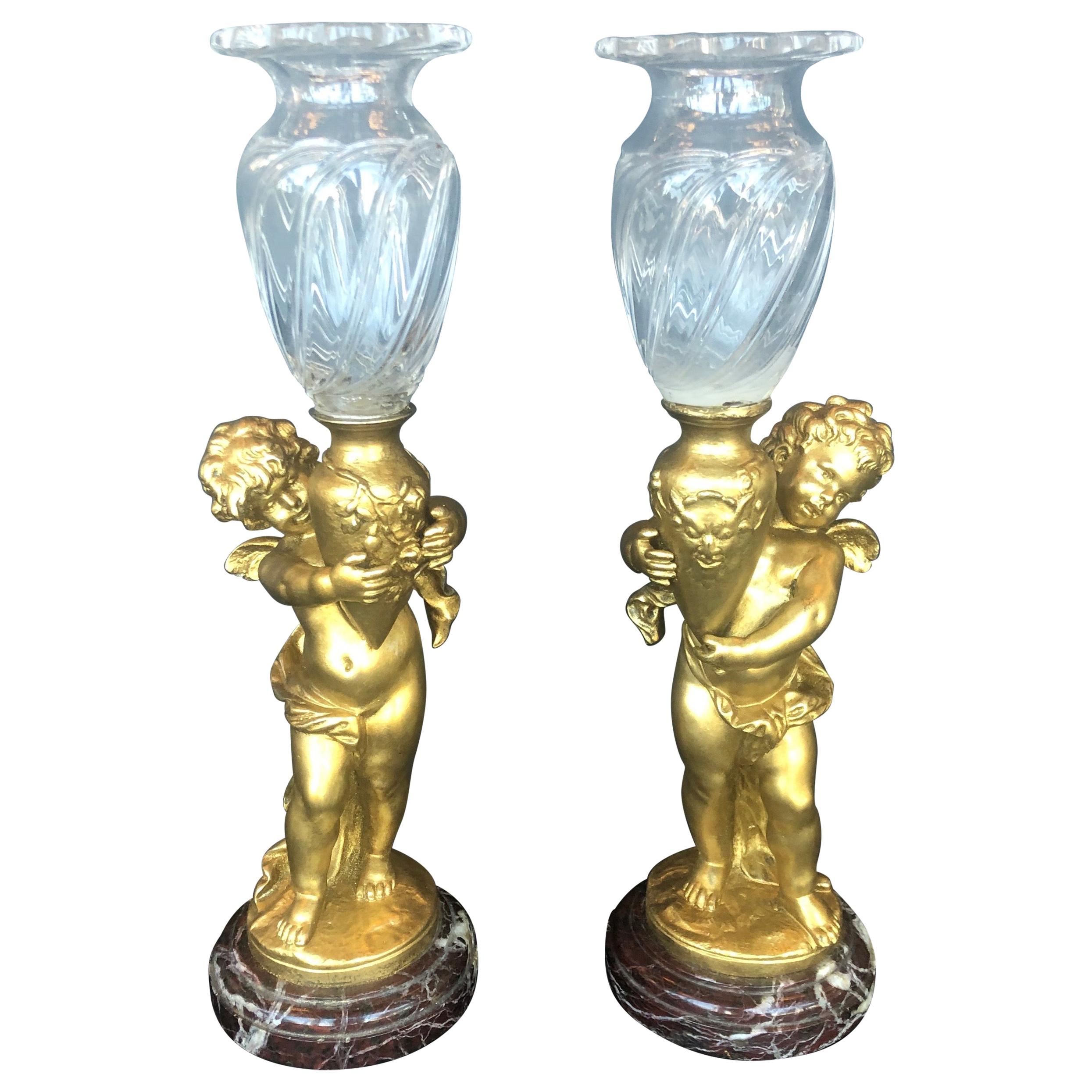 Pair of Bronze Cherubs with Glass Vases For Sale