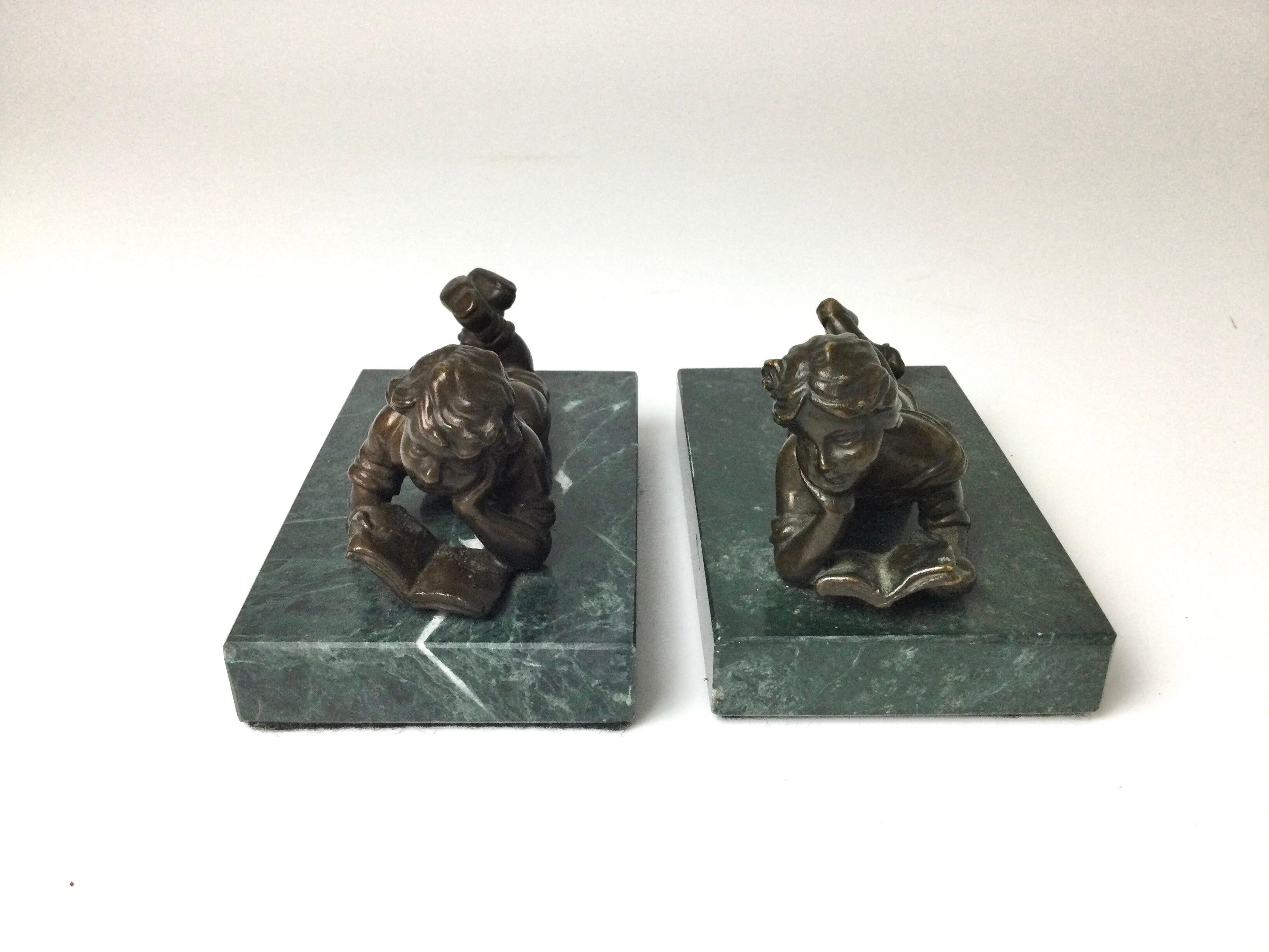 Unknown Pair of Bronze Children Reading on Green Marble Bases For Sale