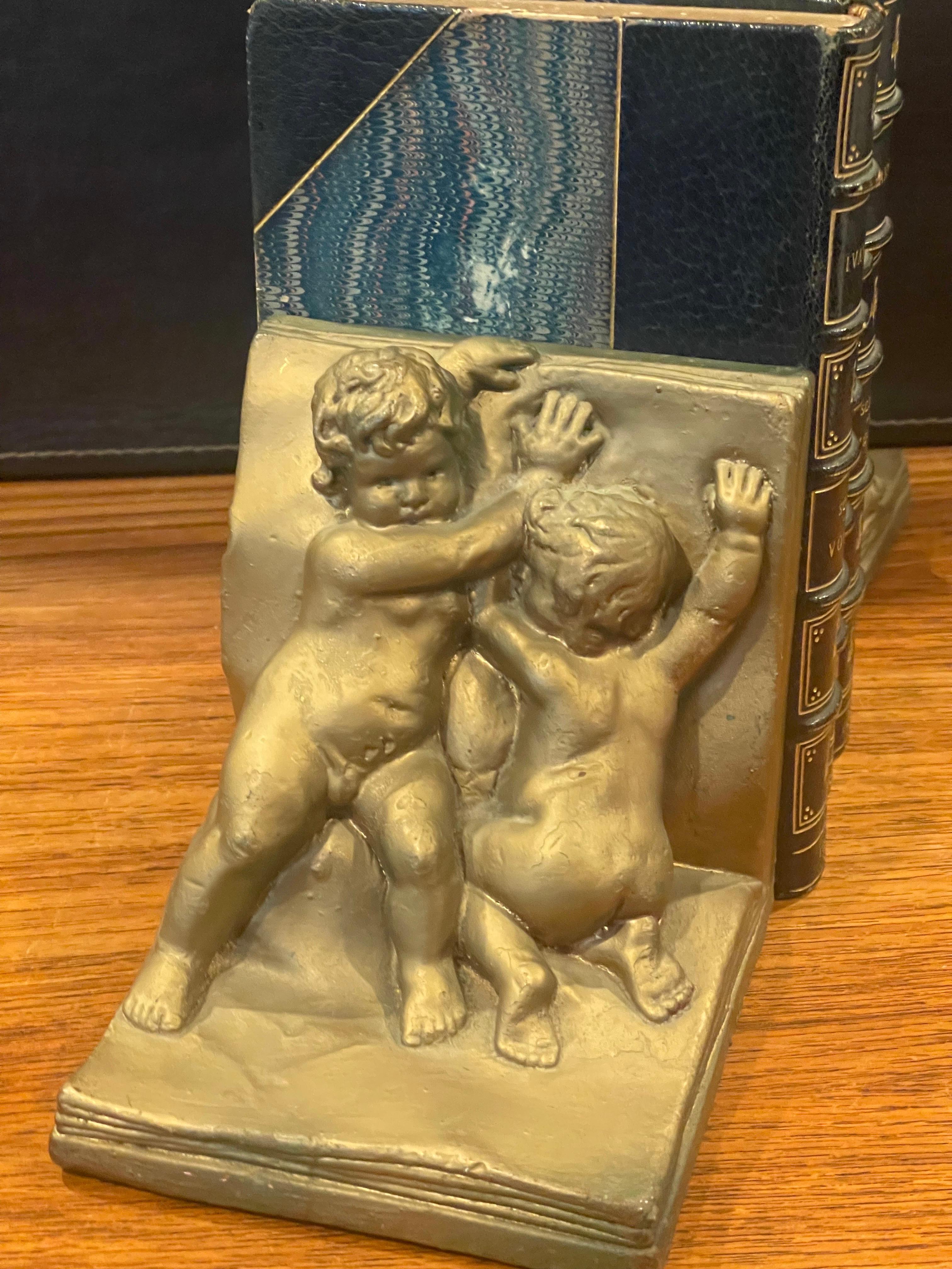 Pair of Bronze Clad Cherub Art Deco Bookends by Art Bronze For Sale 5