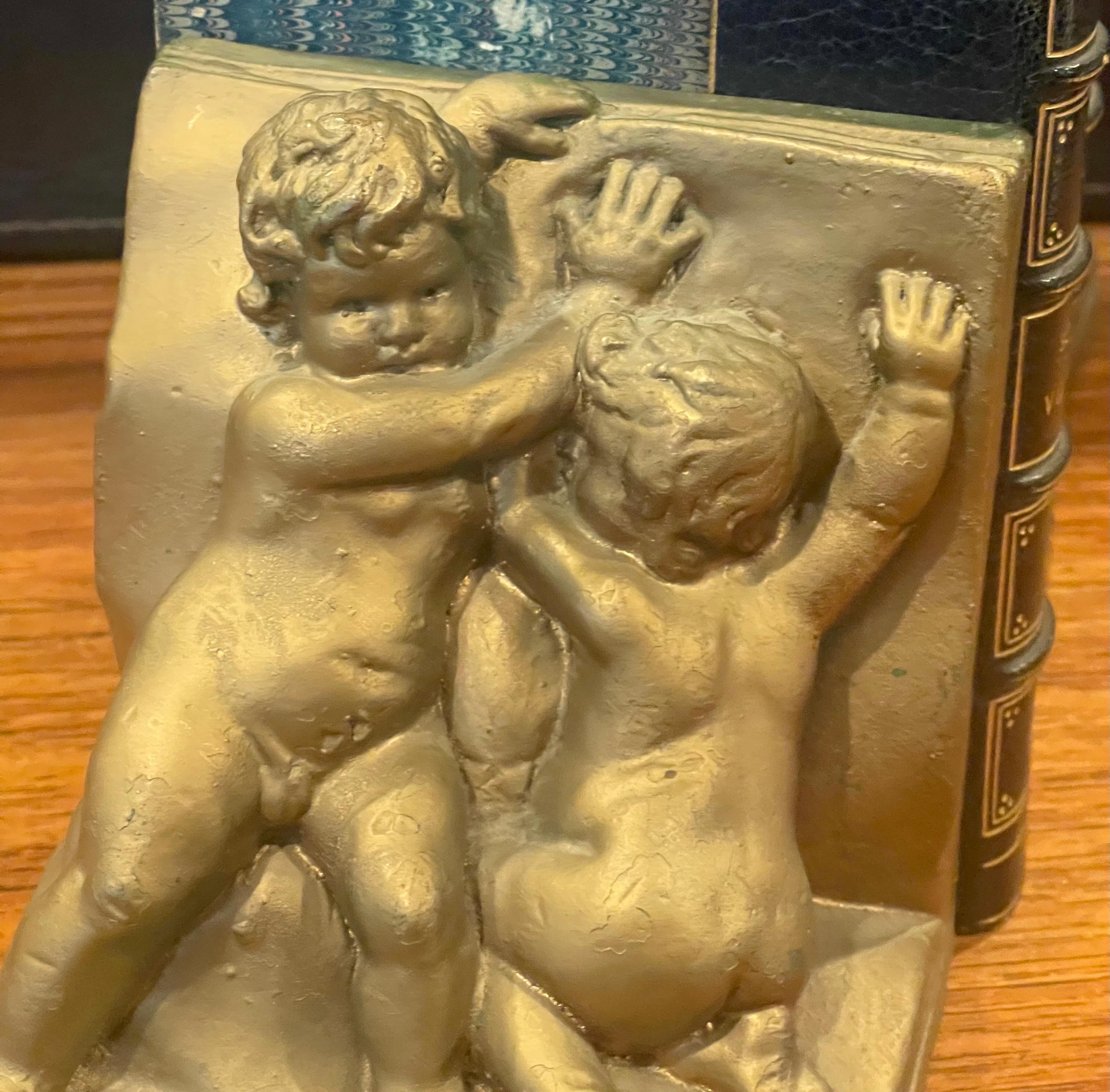 Pair of Bronze Clad Cherub Art Deco Bookends by Art Bronze For Sale 7