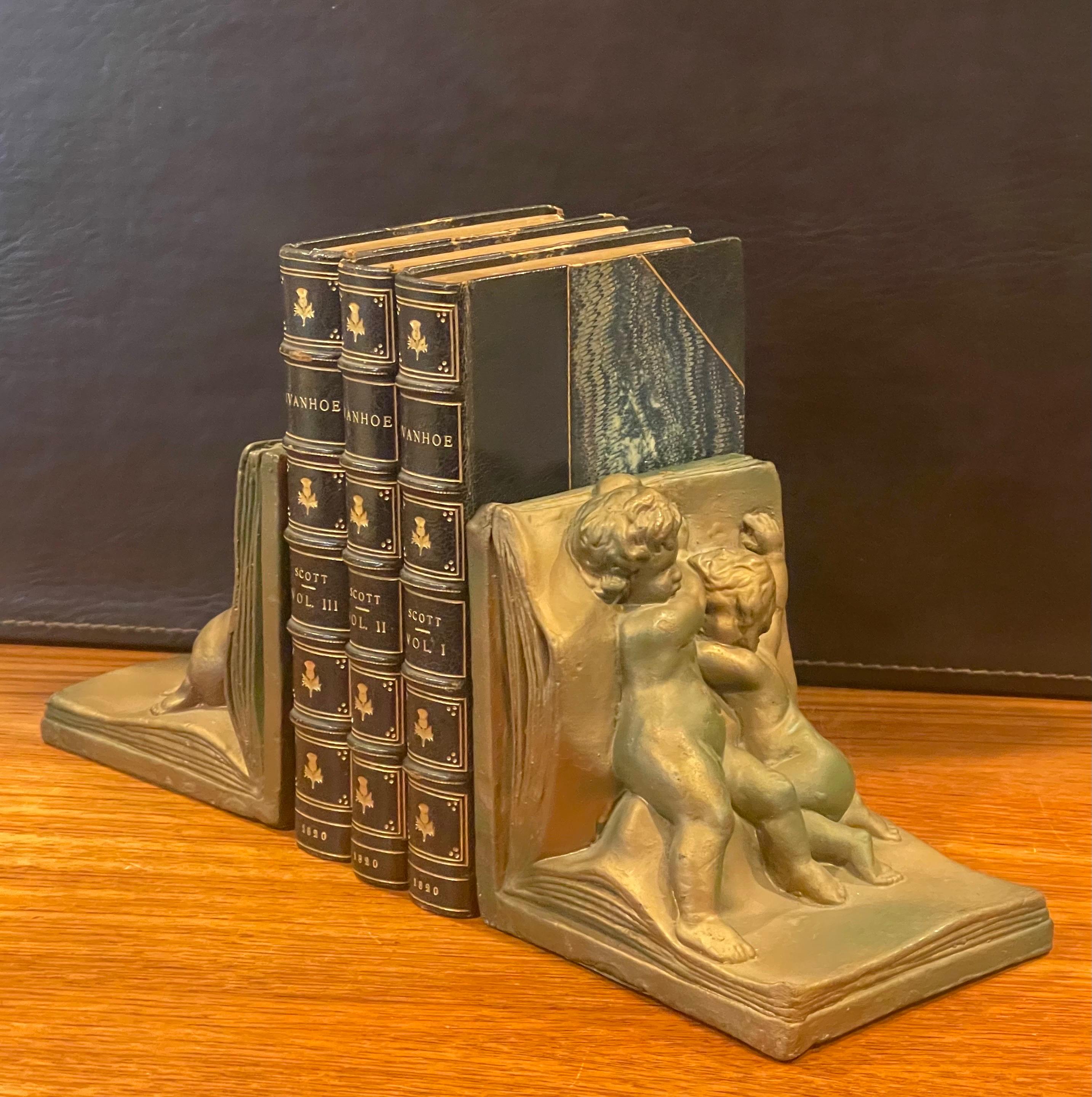 Pair of Bronze Clad Cherub Art Deco Bookends by Art Bronze For Sale 8
