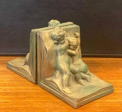 Pair of Bronze Clad Cherub Art Deco Bookends by Art Bronze