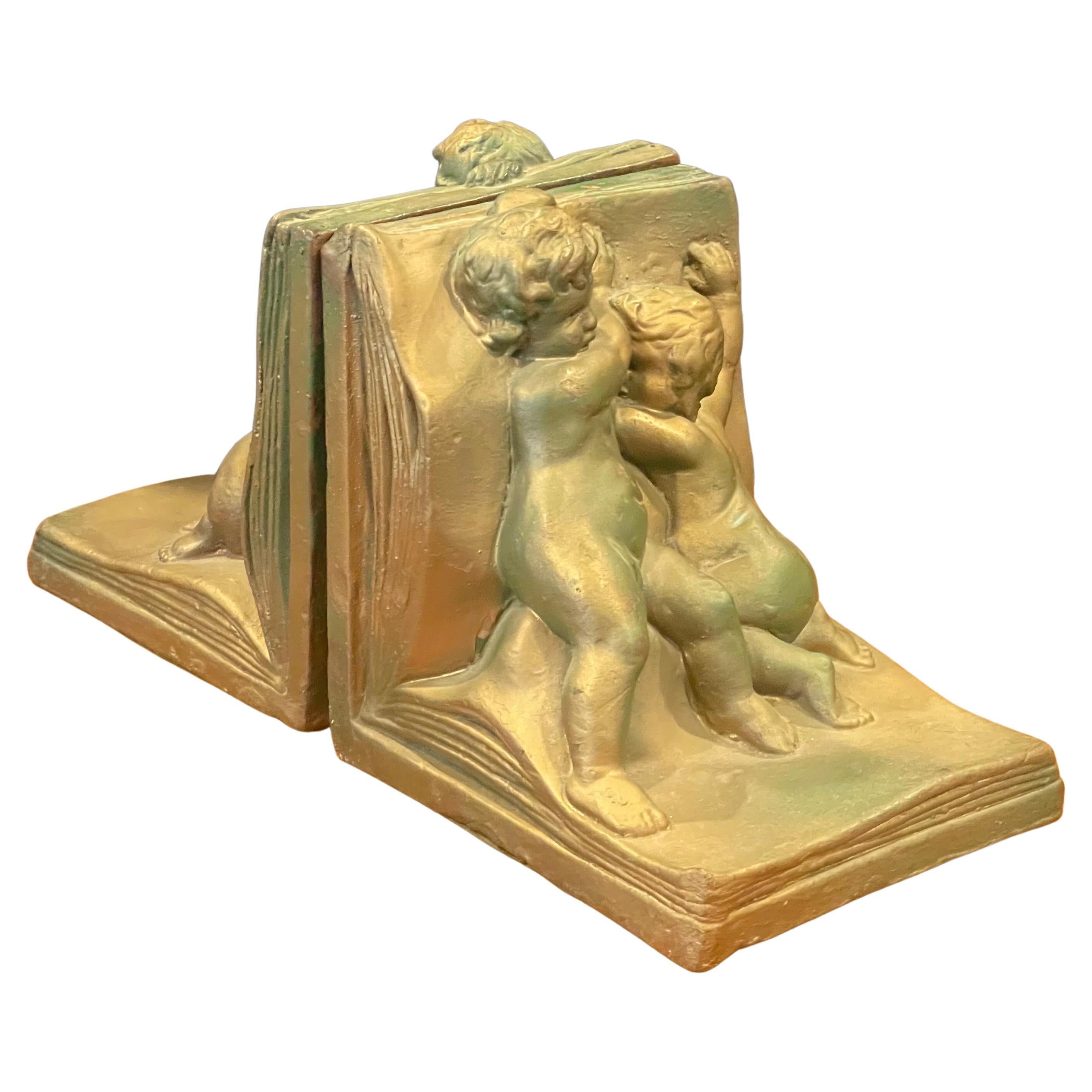 Pair of Bronze Clad Cherub Art Deco Bookends by Art Bronze