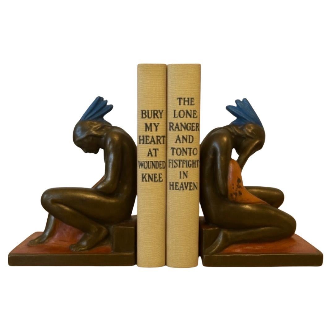 20th Century Pair of Bronze-Clad Indian Braves Bookends by Paul Herzel for Pompeian Bronze Co For Sale