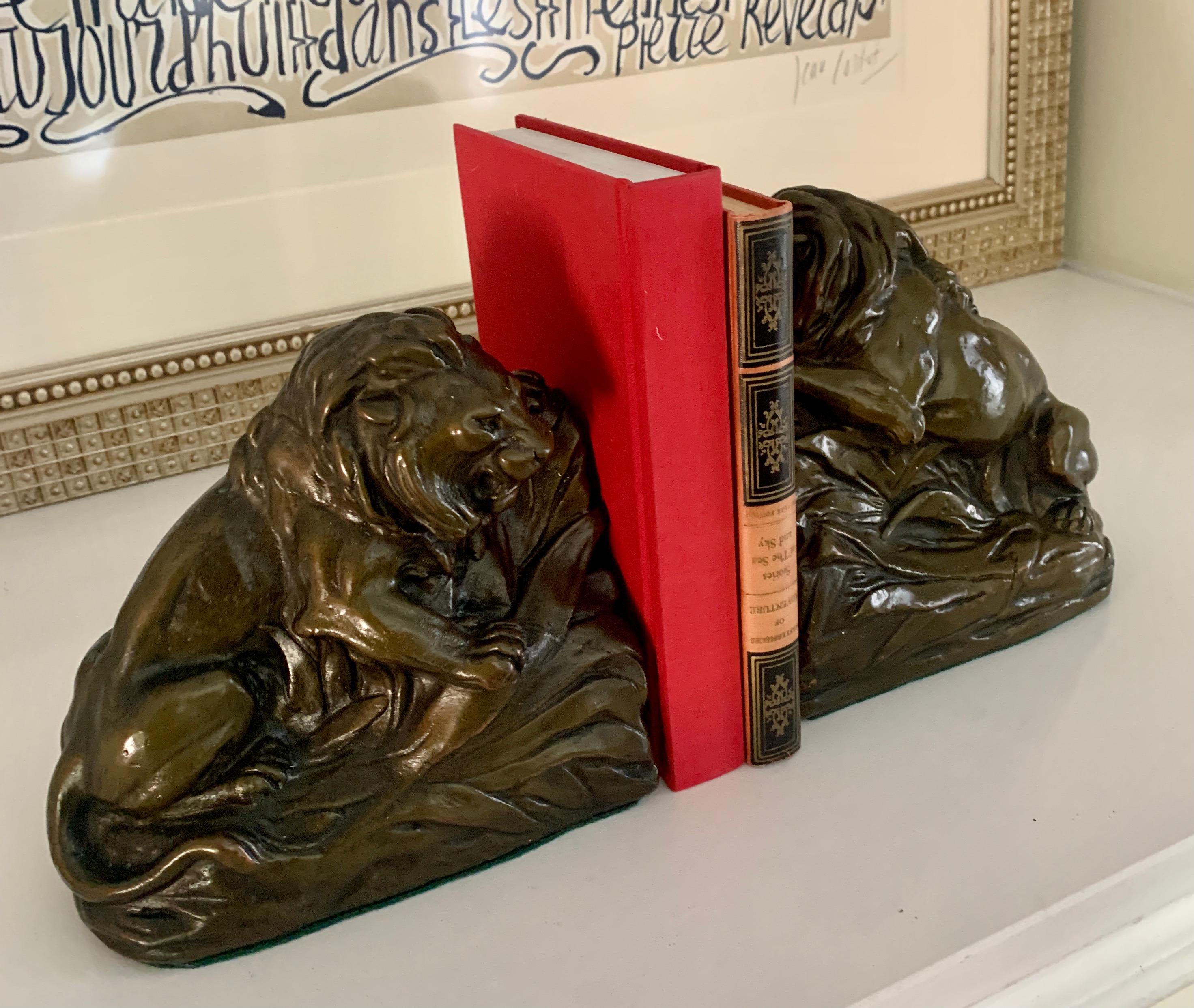Pair of Bronze Clad Lion Bookends In Good Condition In Los Angeles, CA