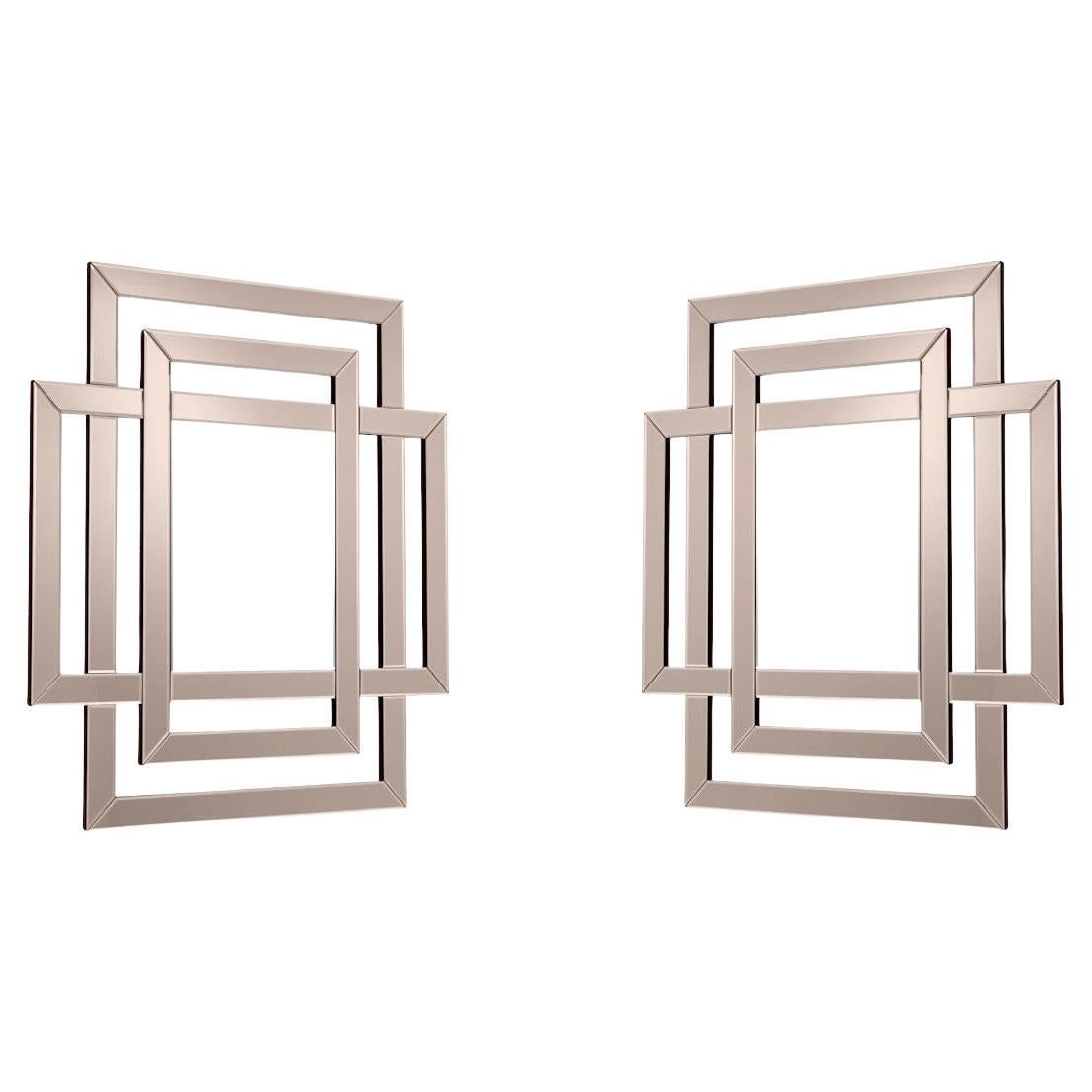 Paire de miroirs couleur bronze. en vente