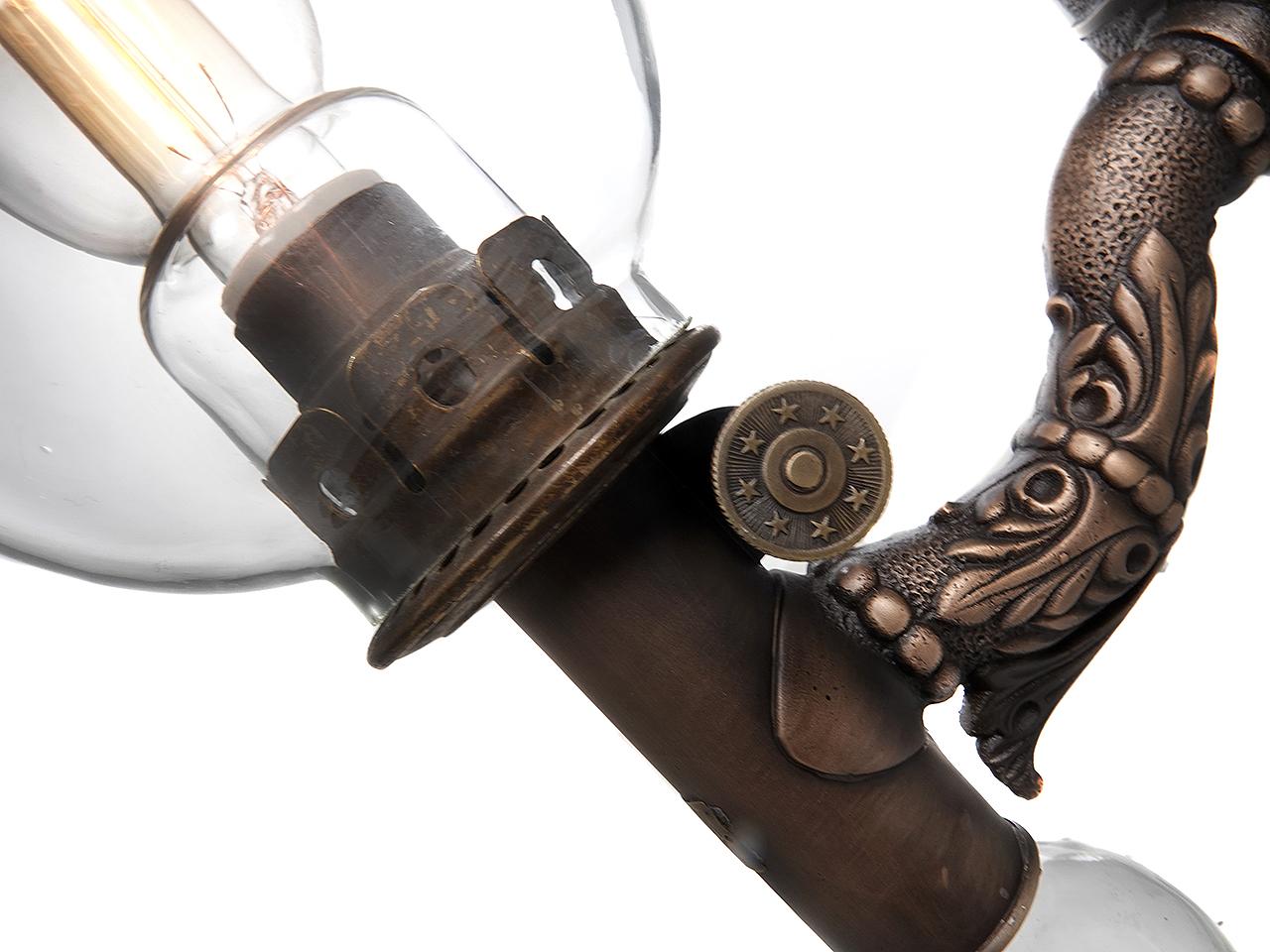 Few of these luxury class Victorian RR lamps still exist. Any remaining examples have found their way into museums and RR car restorations. 
It started with two original bronze Dayton lamp castings. We then redesigned wired the kerosene fuled lamps