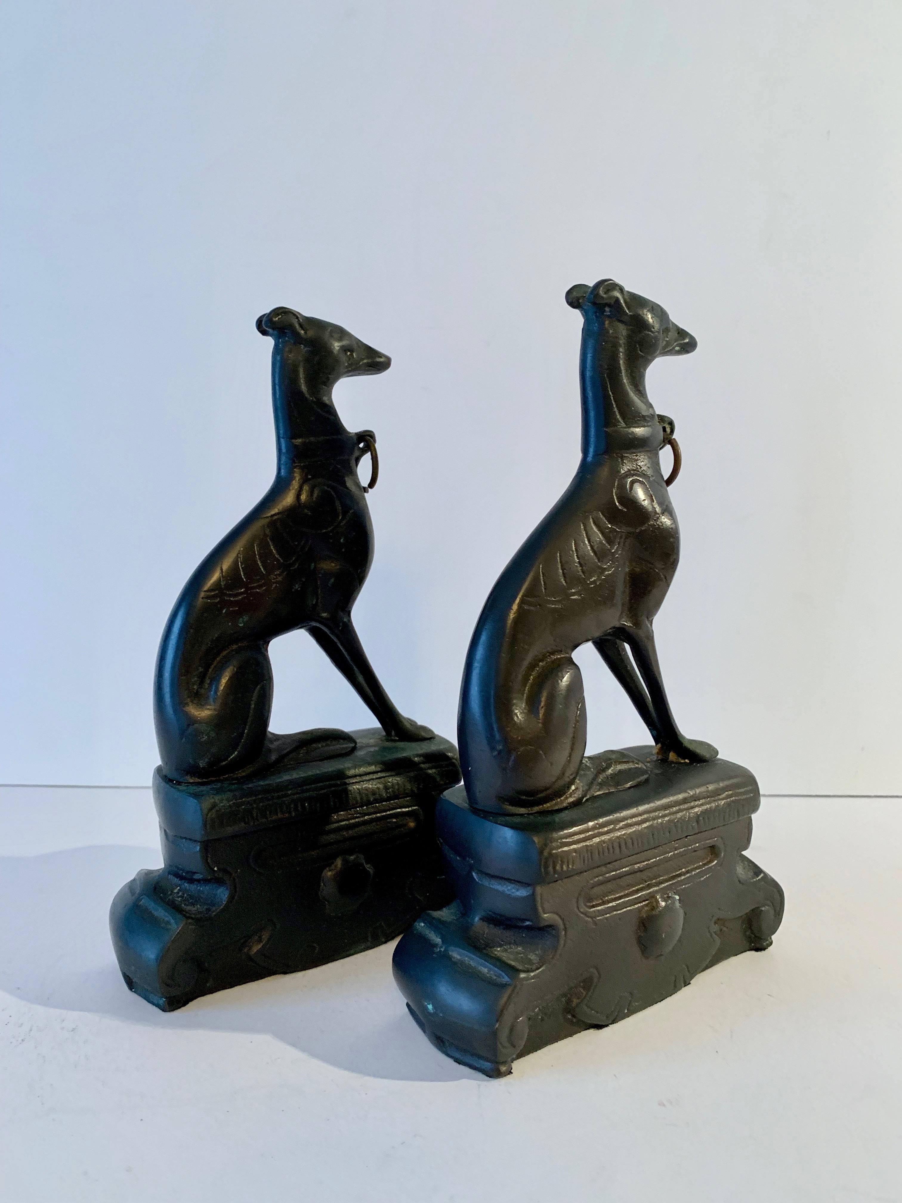 Pair of bronze Doberman Pincher dog bookends - a handsome pair. The profile and detailing are very nice and have a very sophisticated appeal... also great for the child’s room.