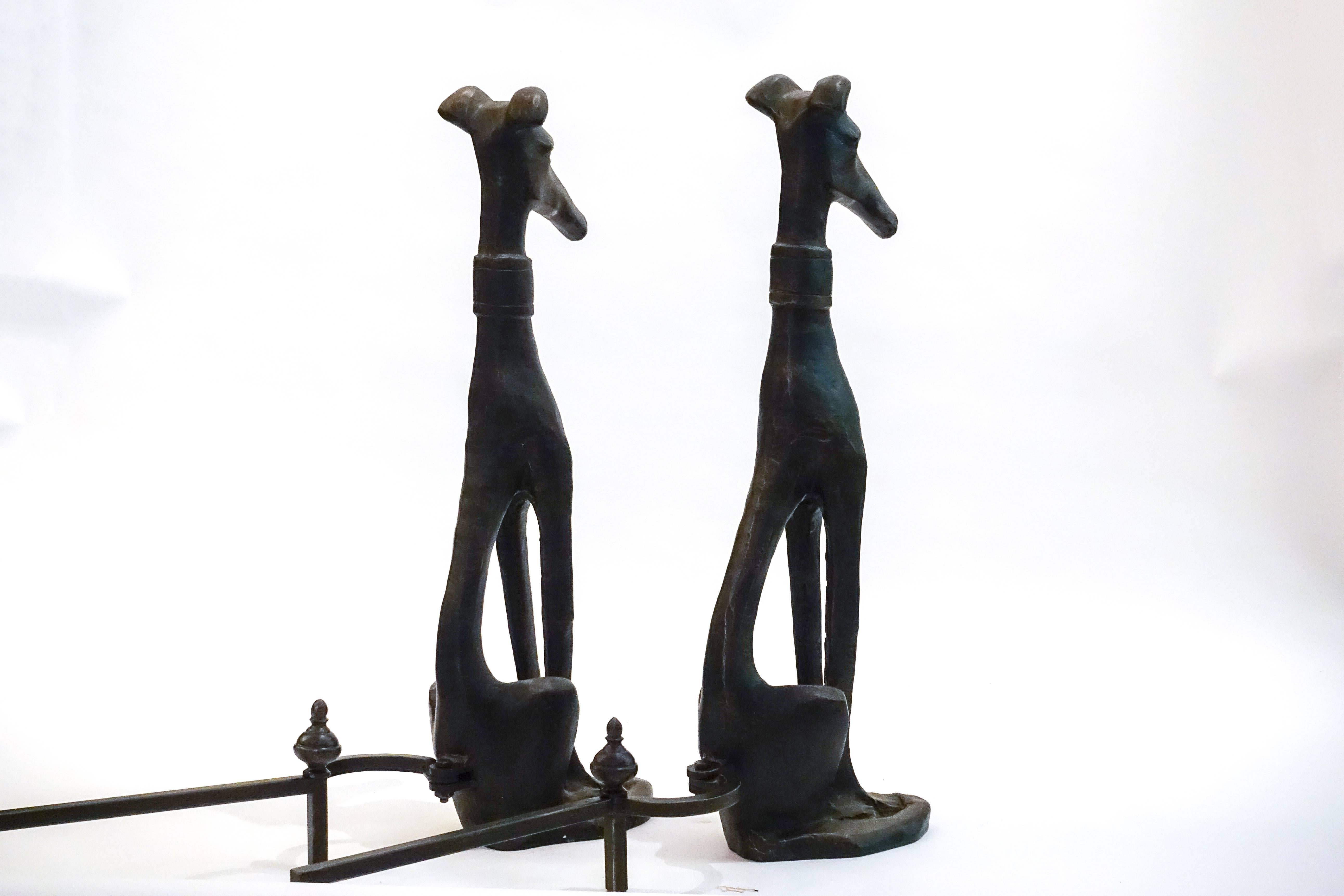 Elegant pair of bronze dog with collar andirons.
