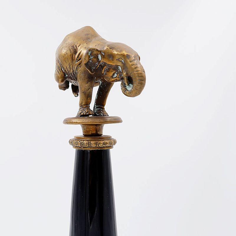 Pair of Bronze elephants on porcelain columns with bronze borders - WONG LEE For Sale 1